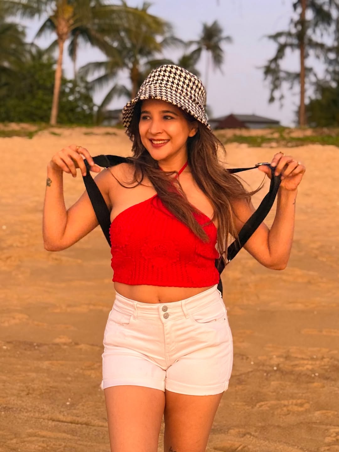 Sakshi stuns in red top and white shorts