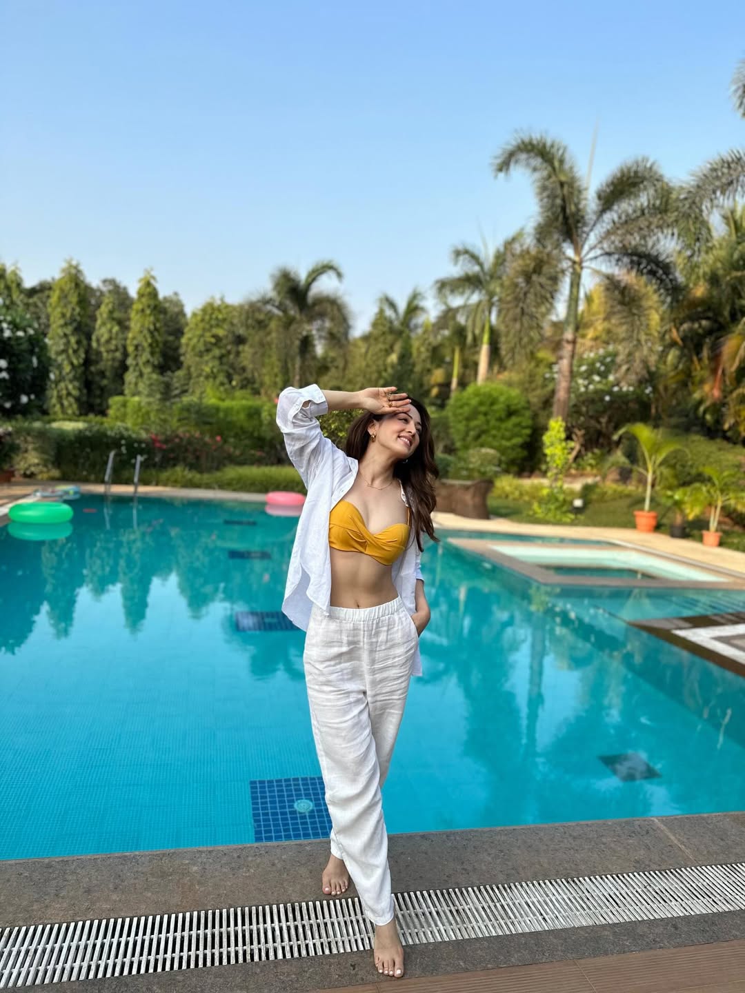 Sandeepa Dhar poolside chic in yellow bikini elegance