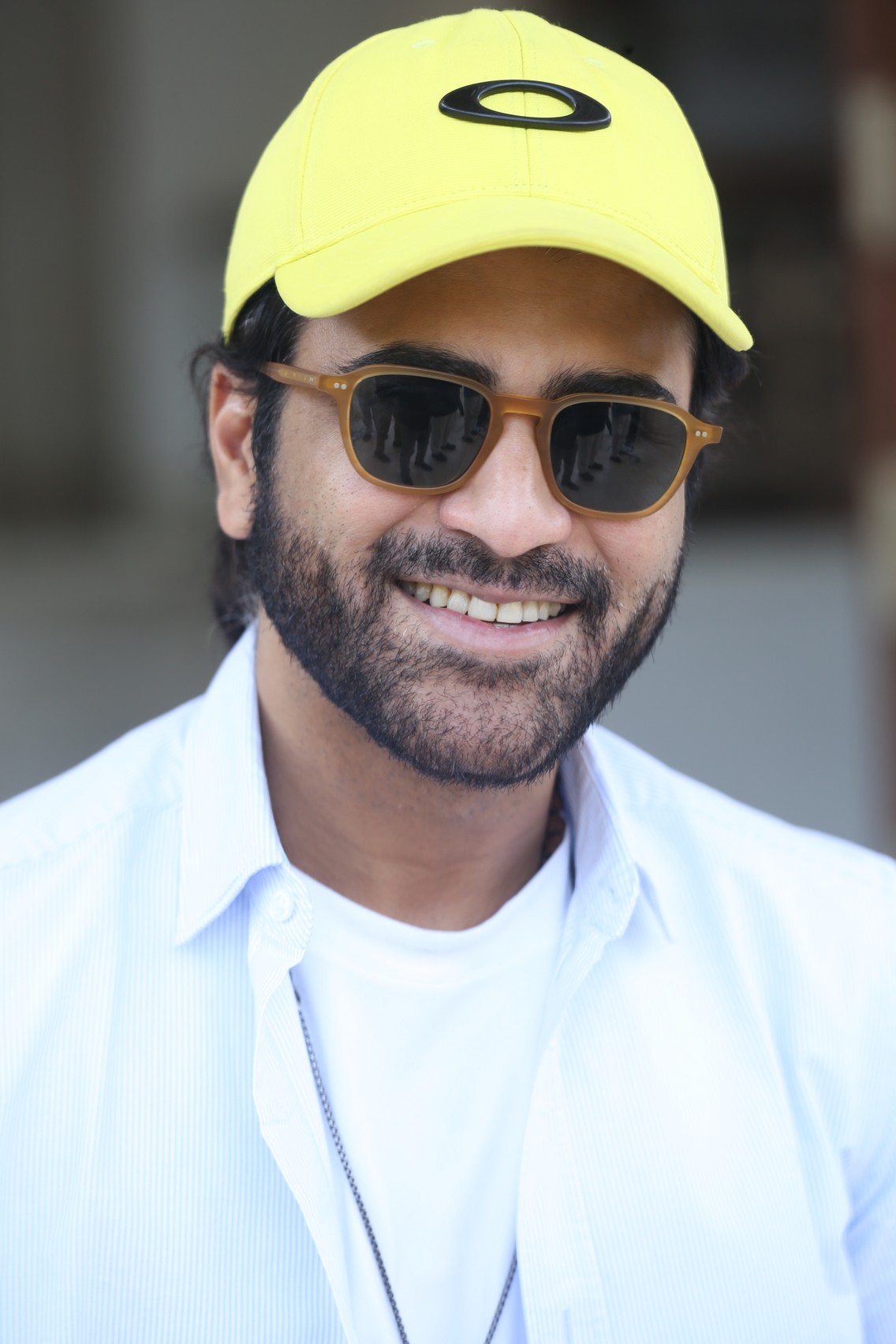 Sharwanand flaunting casual cool with bold yellow cap