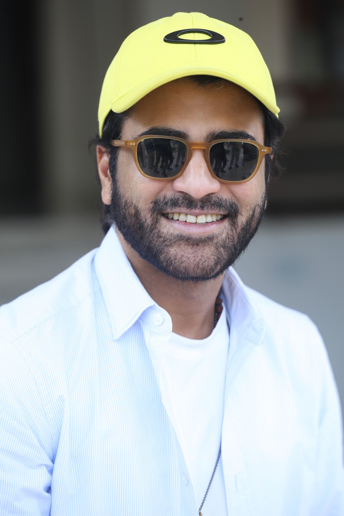 Sharwanand embracing casual style with sunny cap