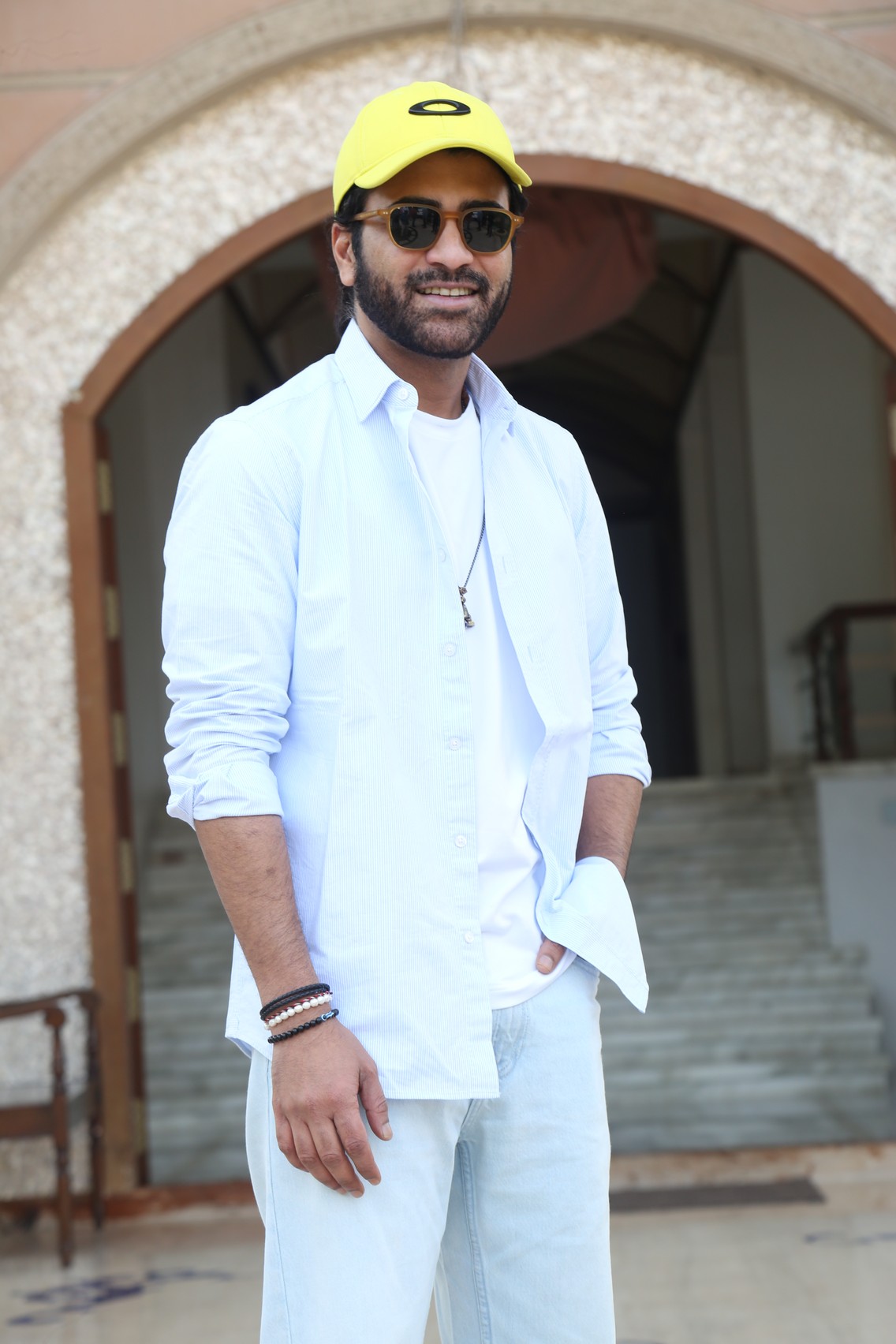Sharwanand brightening style with yellow cap confidence