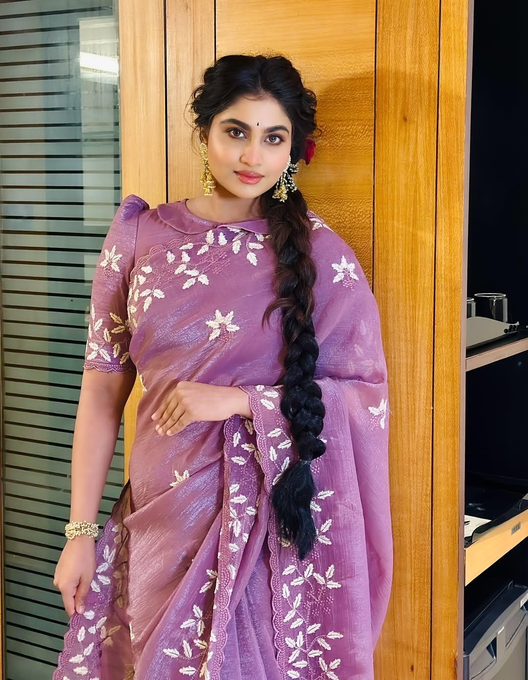 Shivani Narayanan stuns in purple saree with bold braid