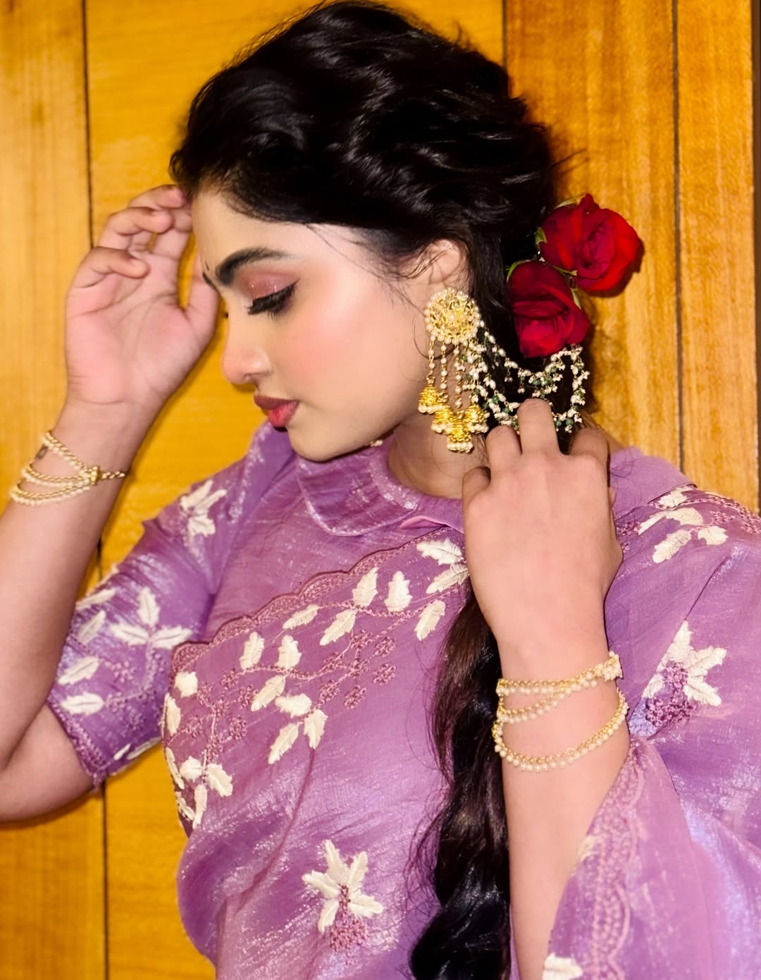 Shivani Narayanan dazzles in elegant purple outfit with roses