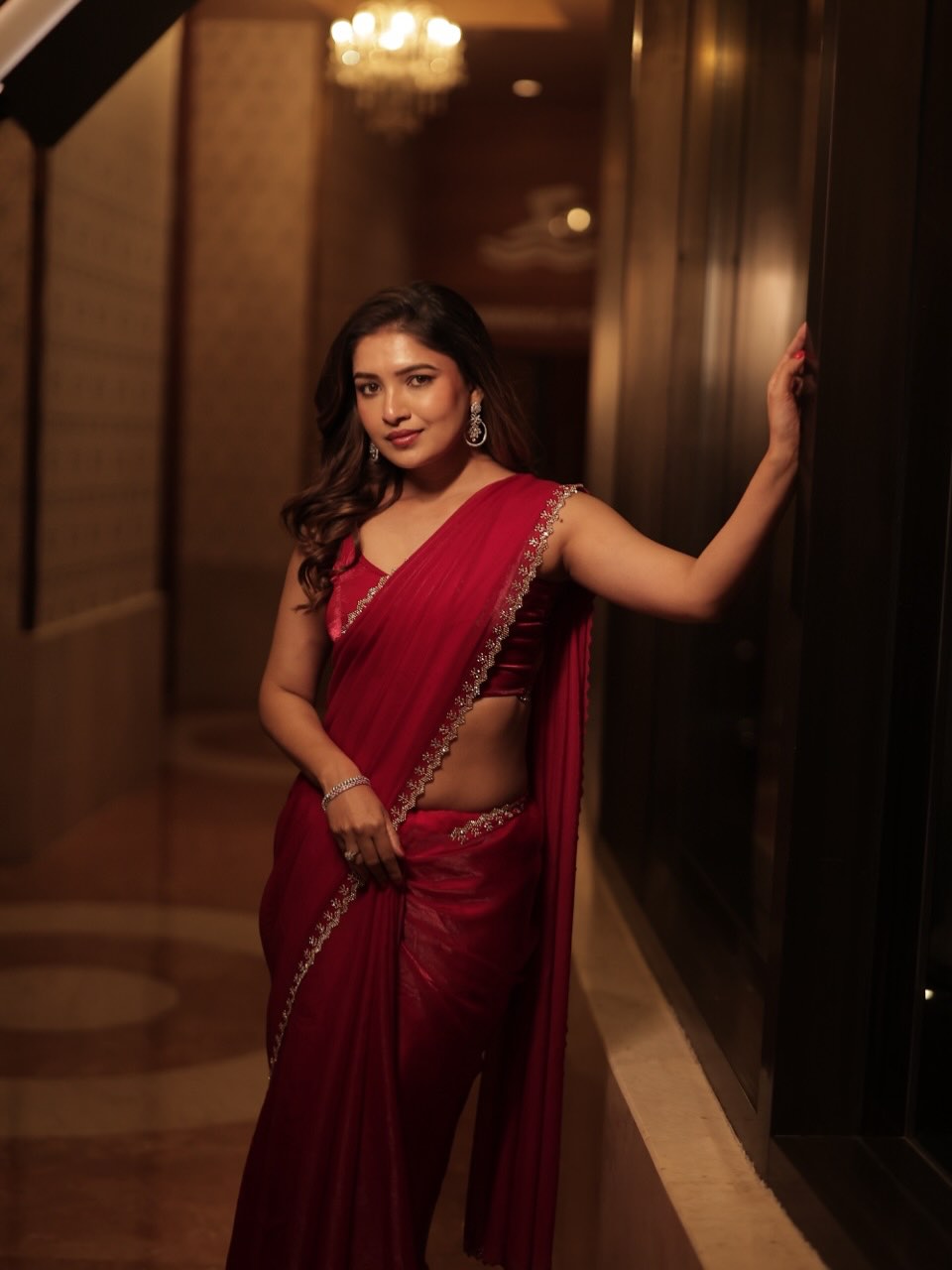 Vani Bhojan radiating grace in red saree