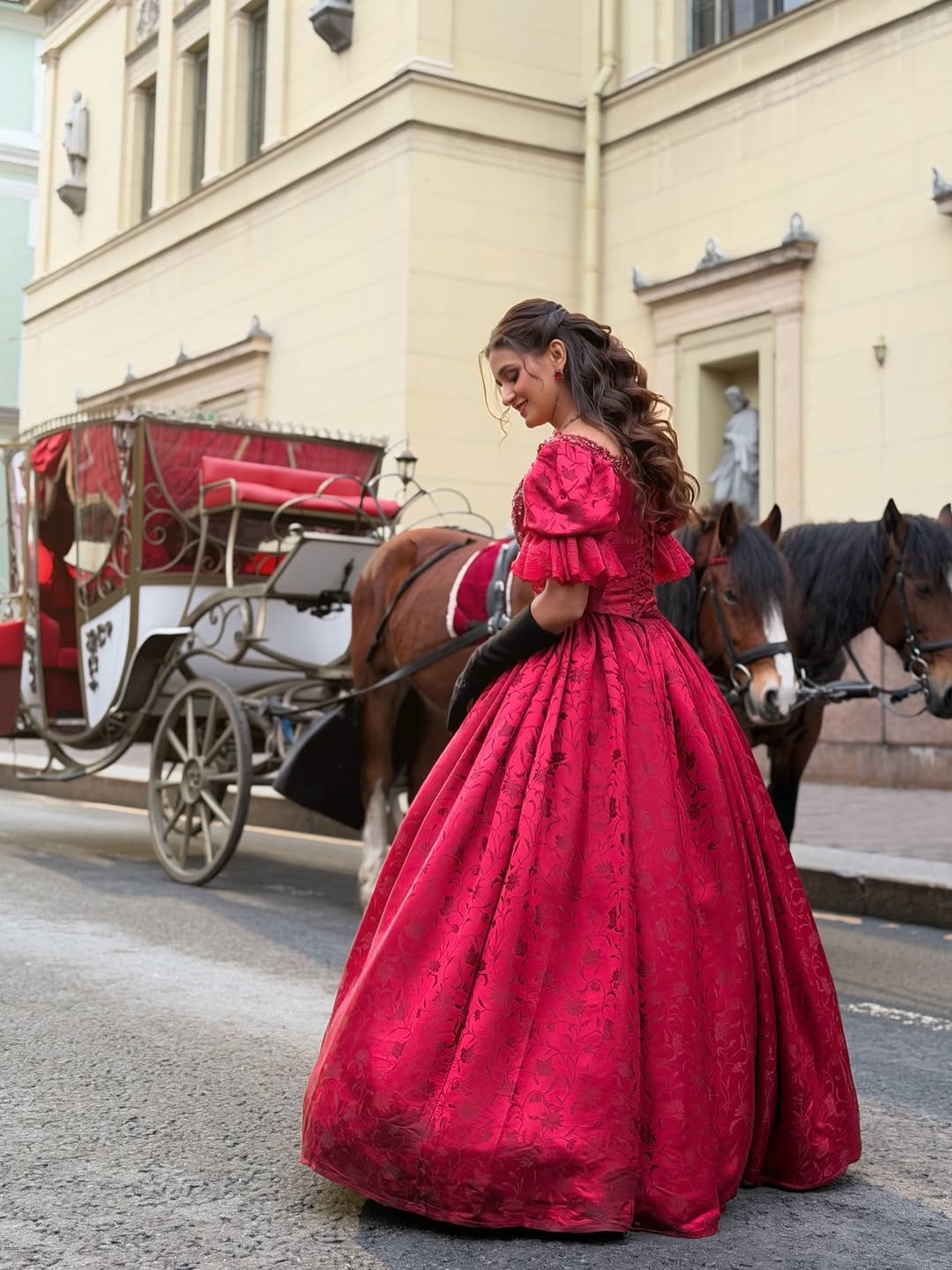 Shakti Mohan queenly red gown elegance