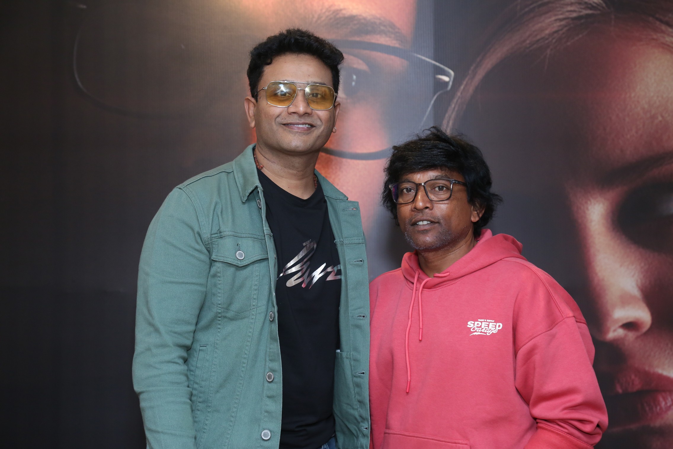 Thaksh Ajithvasan Uggina media pose together