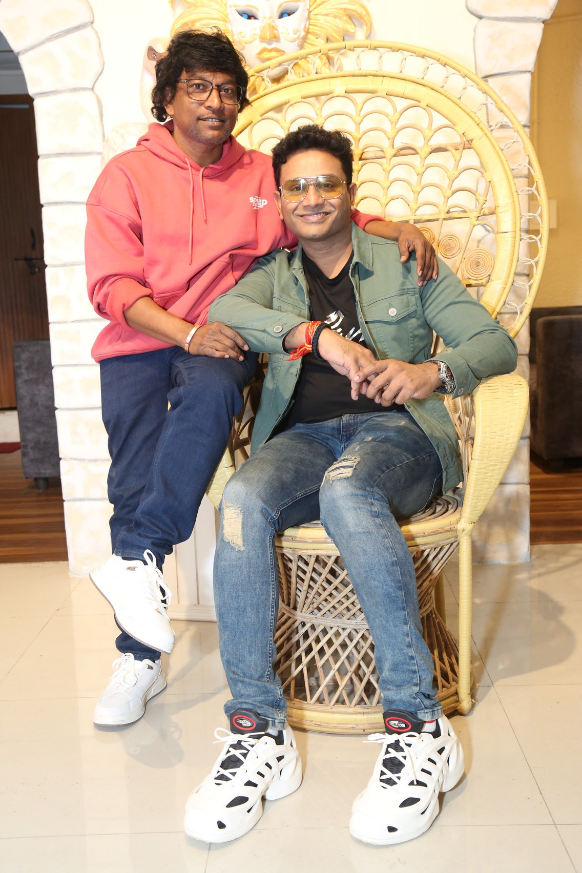 Ajithvasan Uggina Thaksh seated media pose