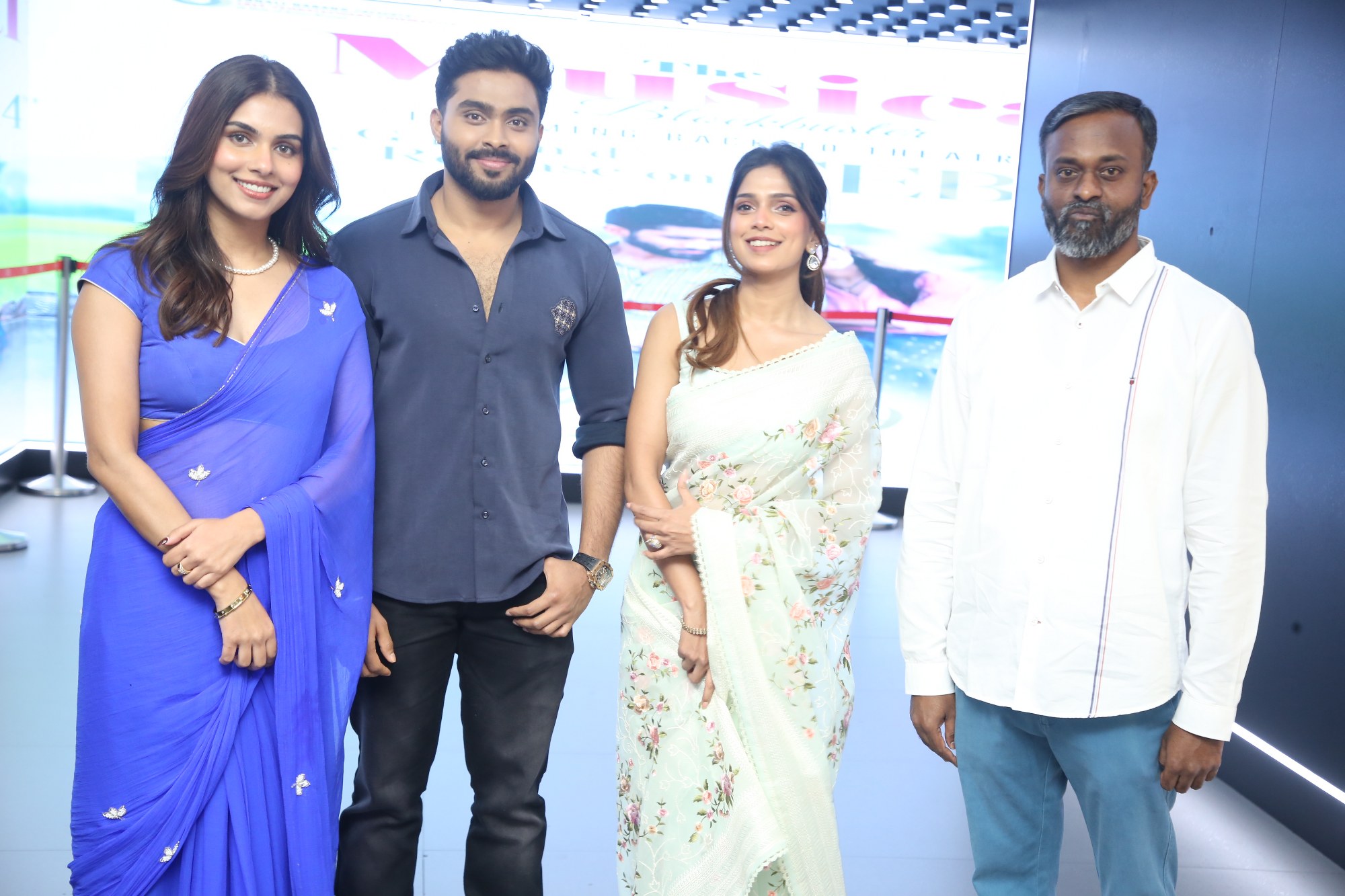 Actors posing together during media session