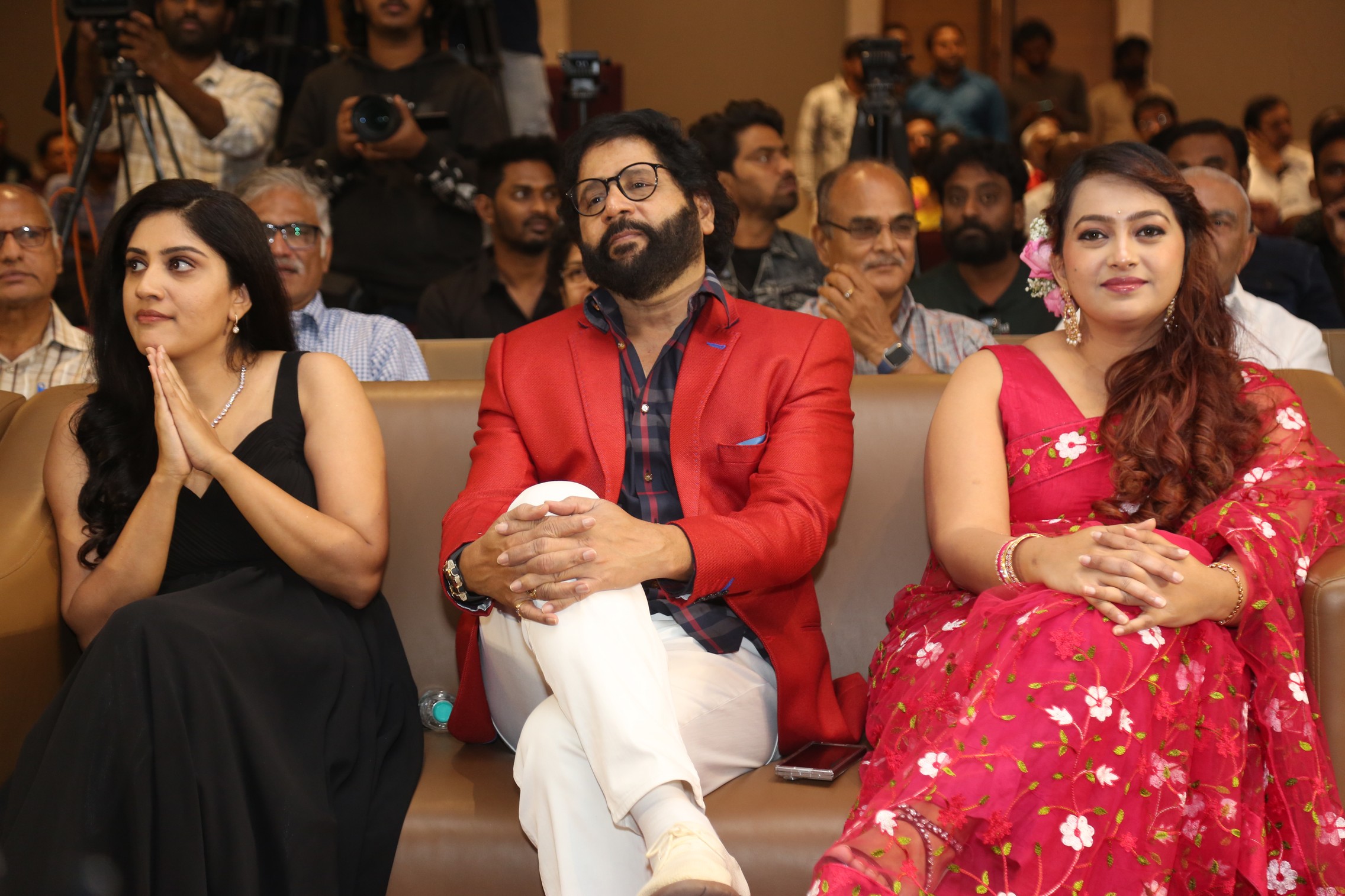 Cast and crew celebrating at pre release event