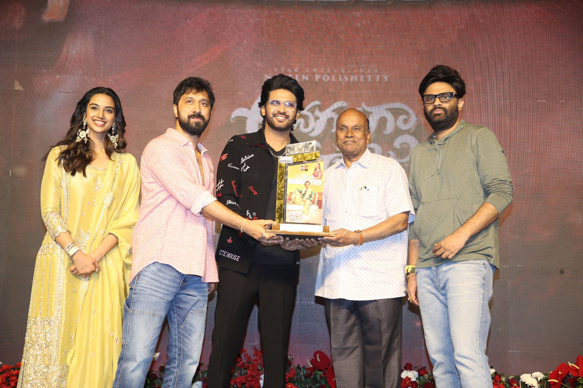 Cast enjoying cheerful celebration moment