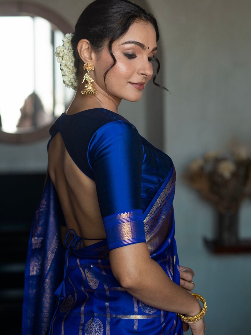 Andrea Jeremiah stylish traditional saree graceful pose
