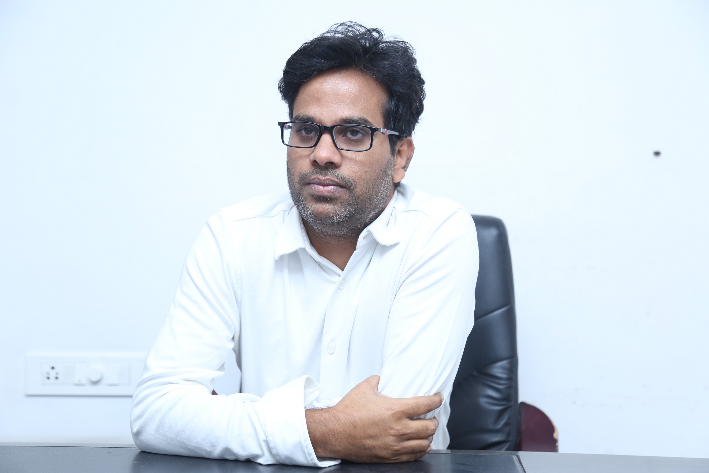 Anudeep KV professional look with glasses