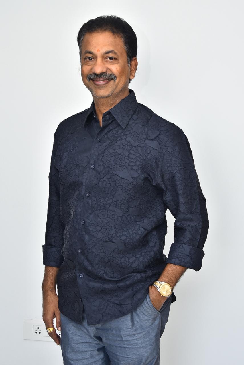 Chinta Gopalakrishna Reddy textured navy shirt stylish pose
