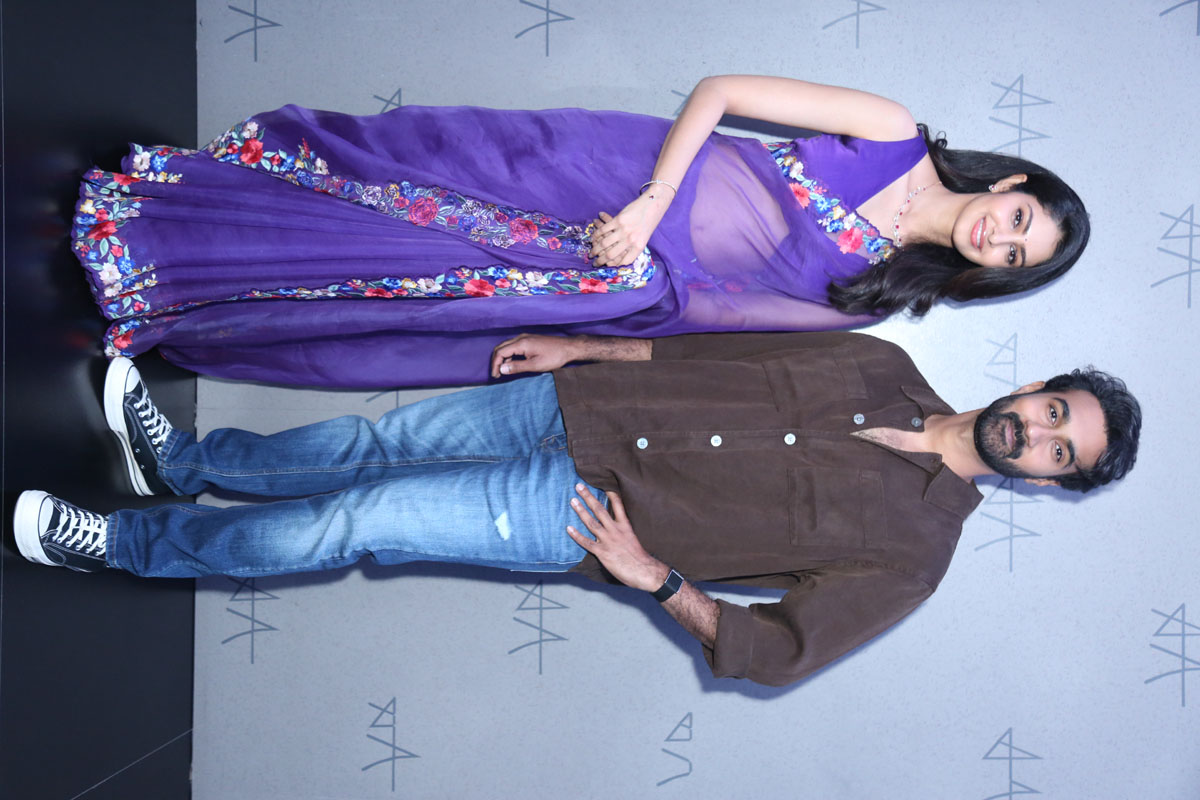 Manasa Varanasi Santosh Soban posing together