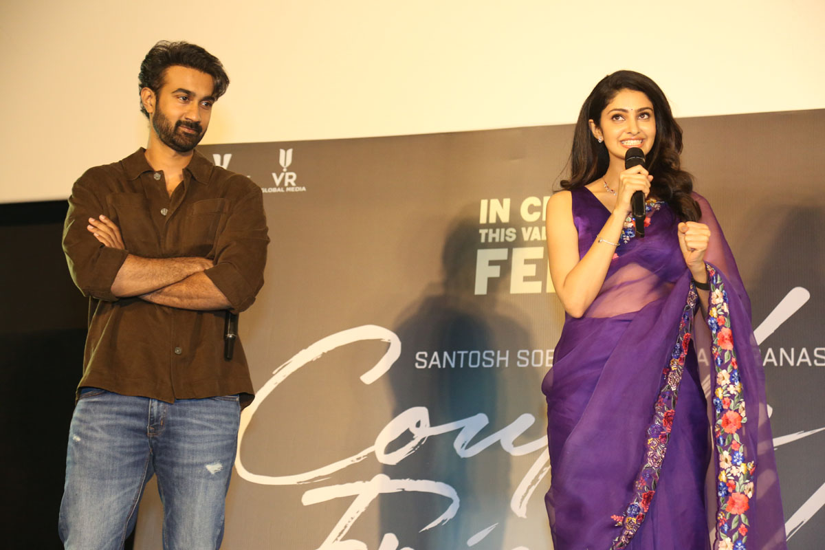 Manasa Varanasi speaking on stage