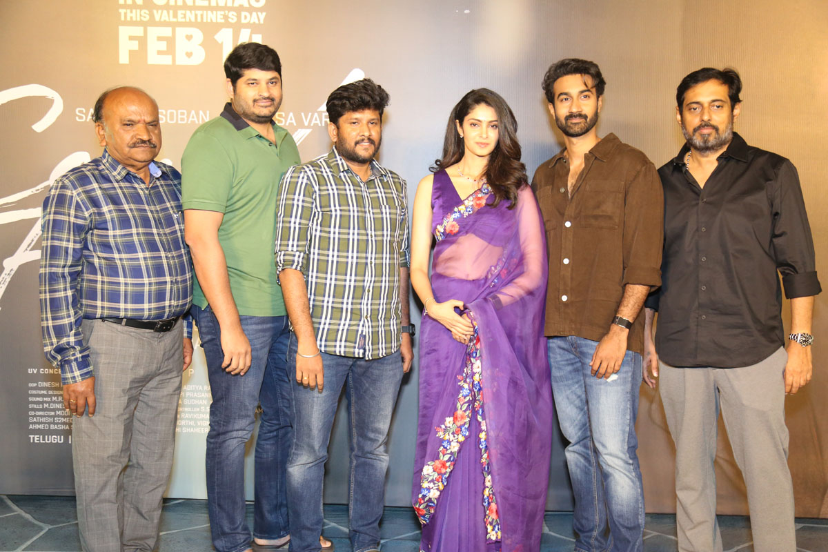 Cast and producers posing at event