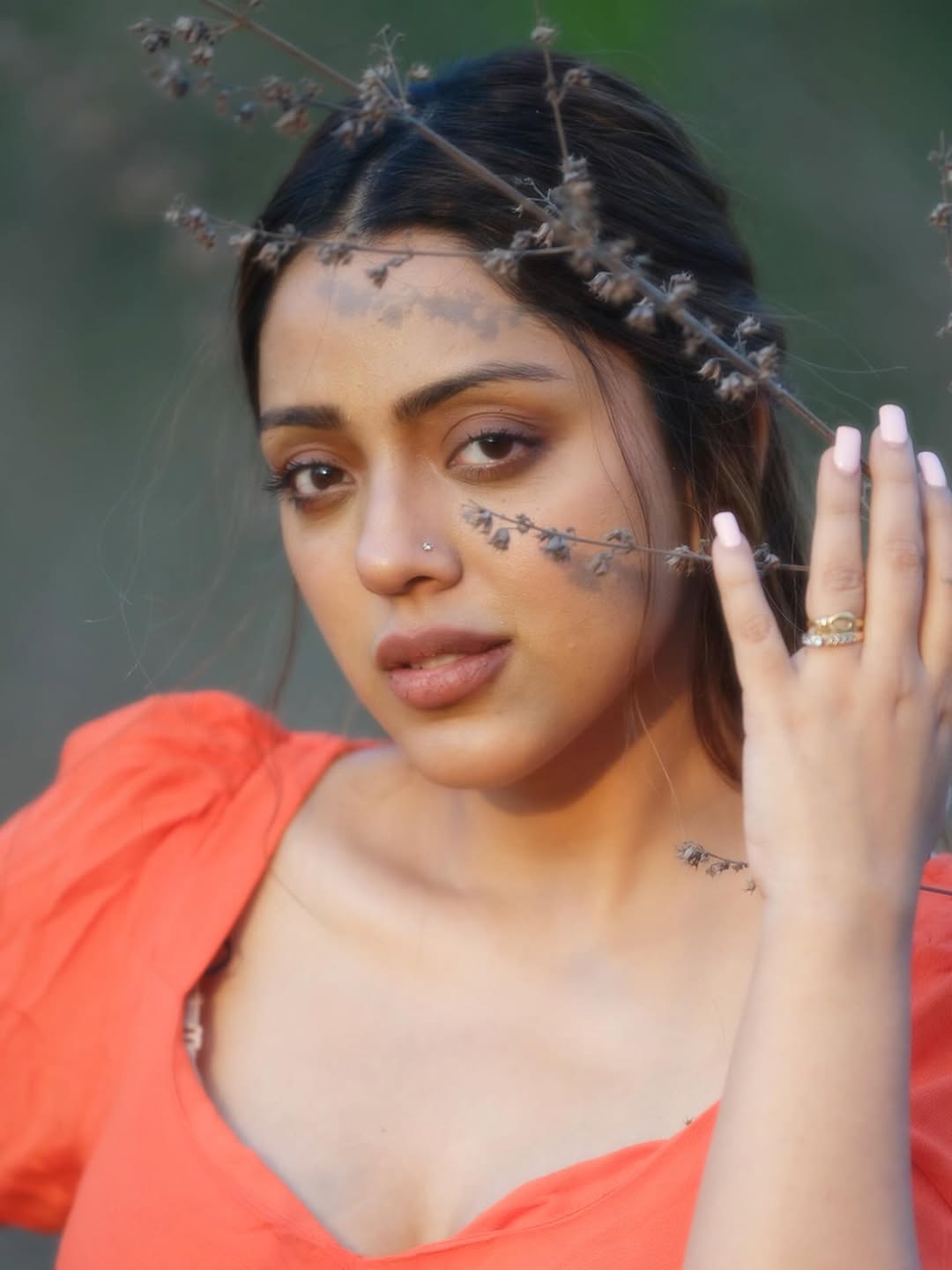 Deviyani Sharma elegant pose amid branches