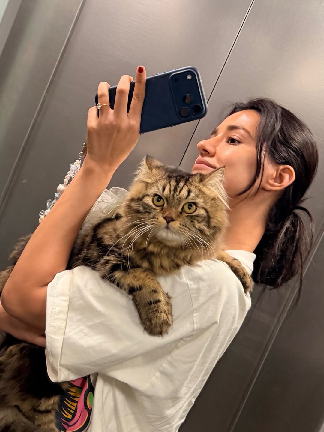 Disha Patani elevator chic feline glamour