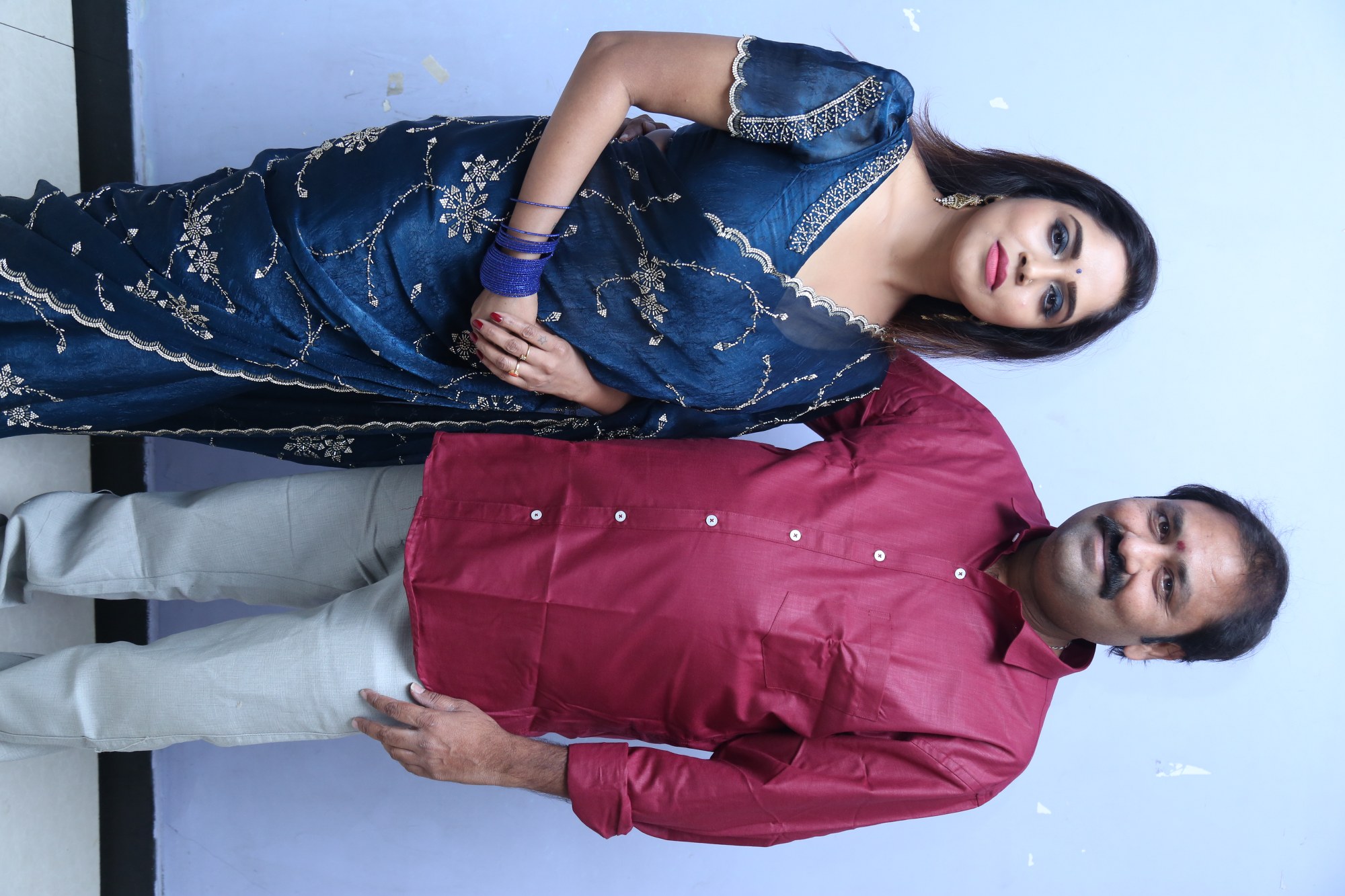 Karunya Chowdary and Suman Babu posing at event