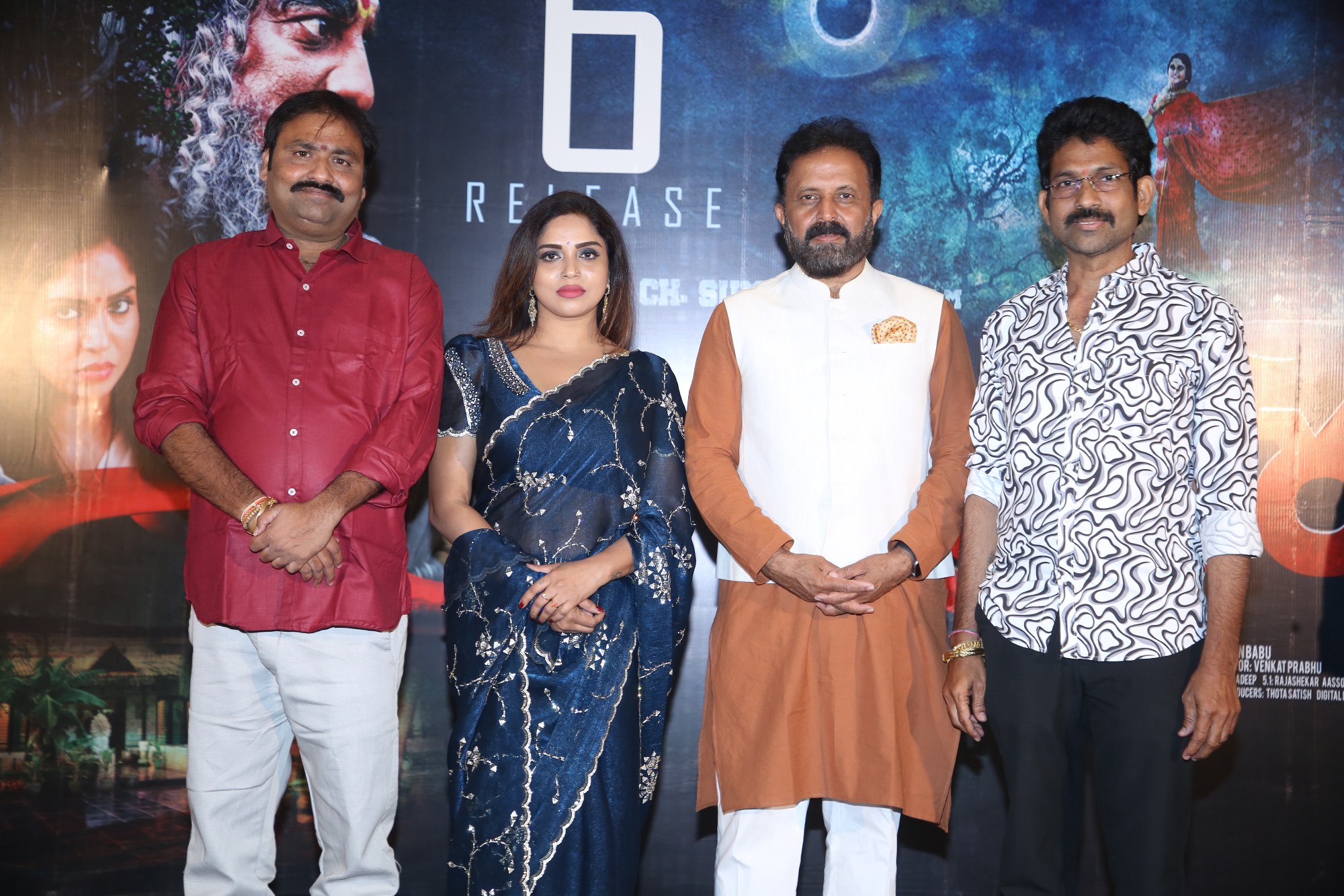 Cast and crew posing at function