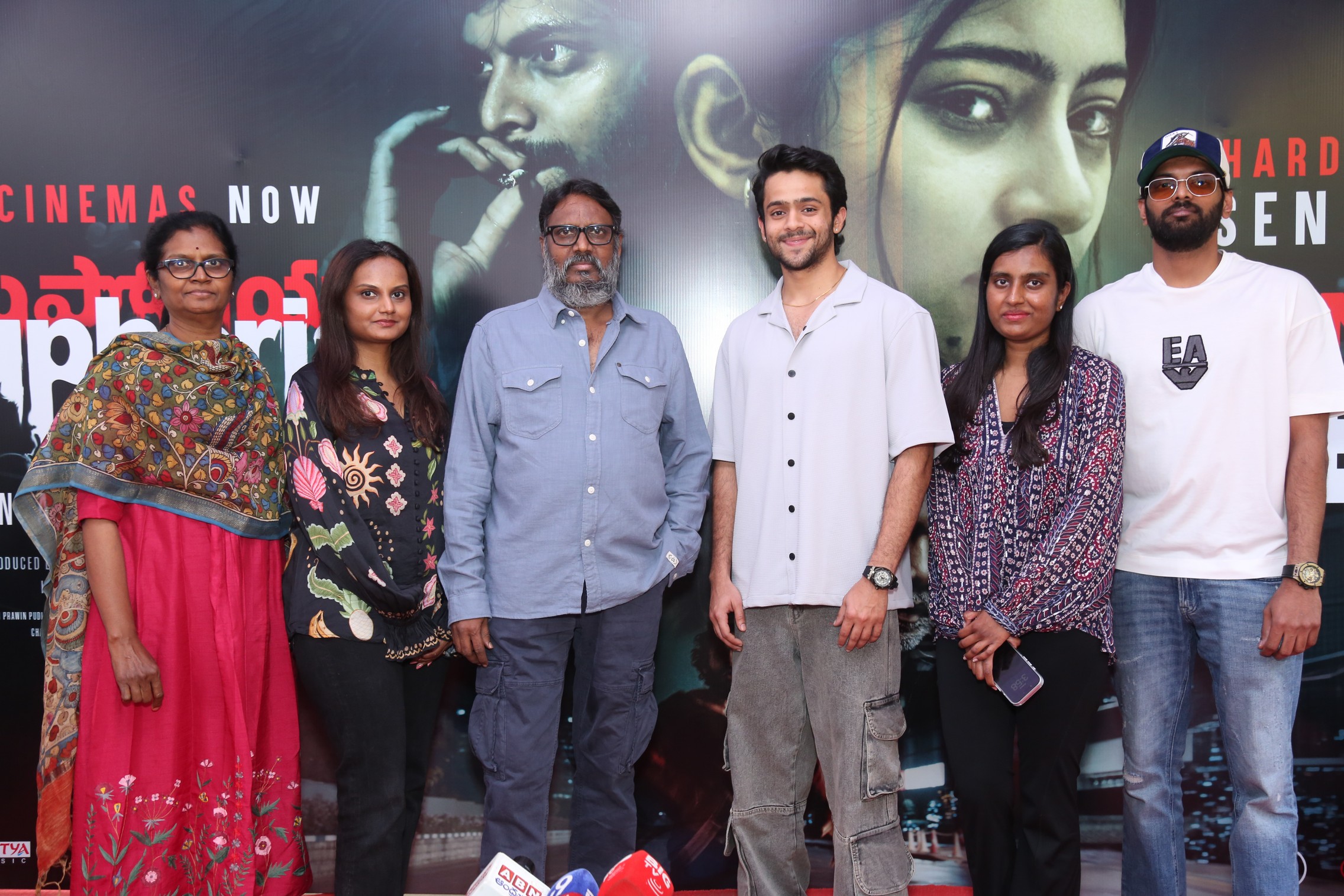 Euphoria team posing on stage