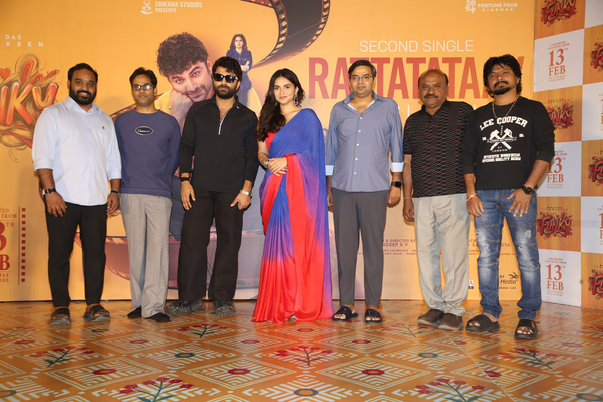 Funky film cast and crew group pose