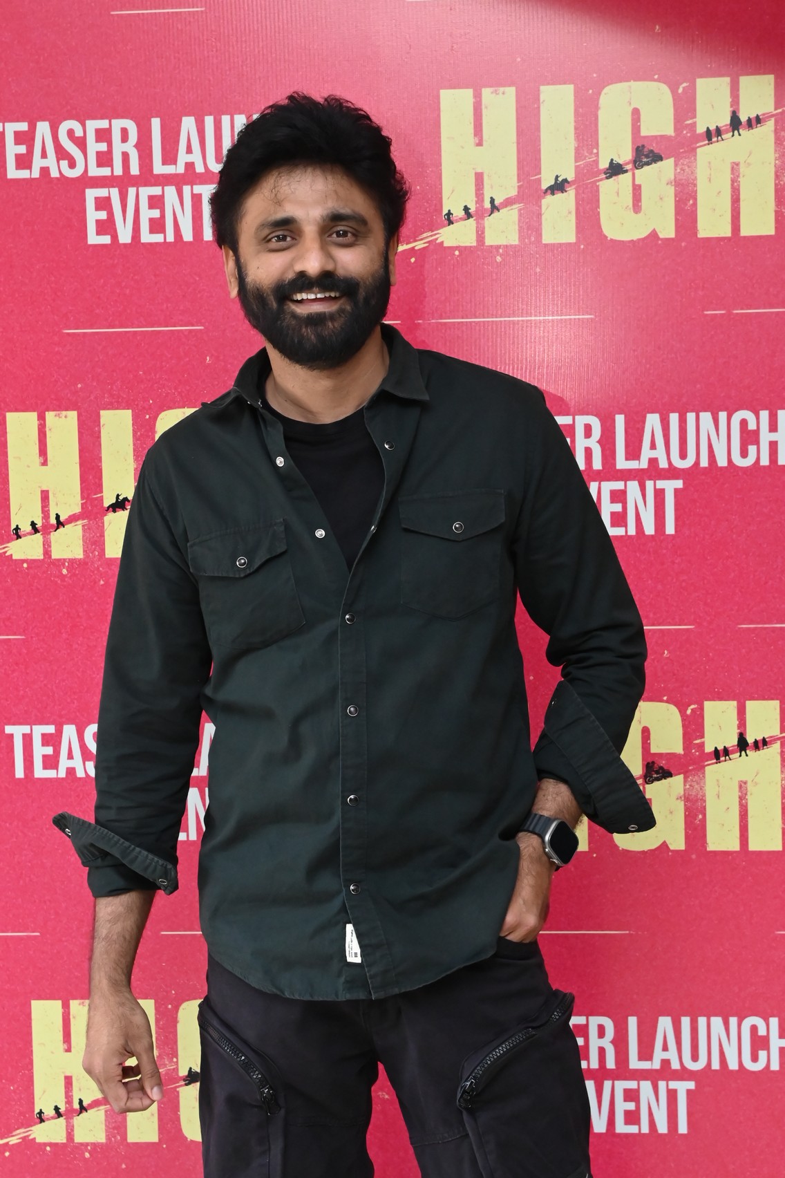 Director S Krishna posing at event