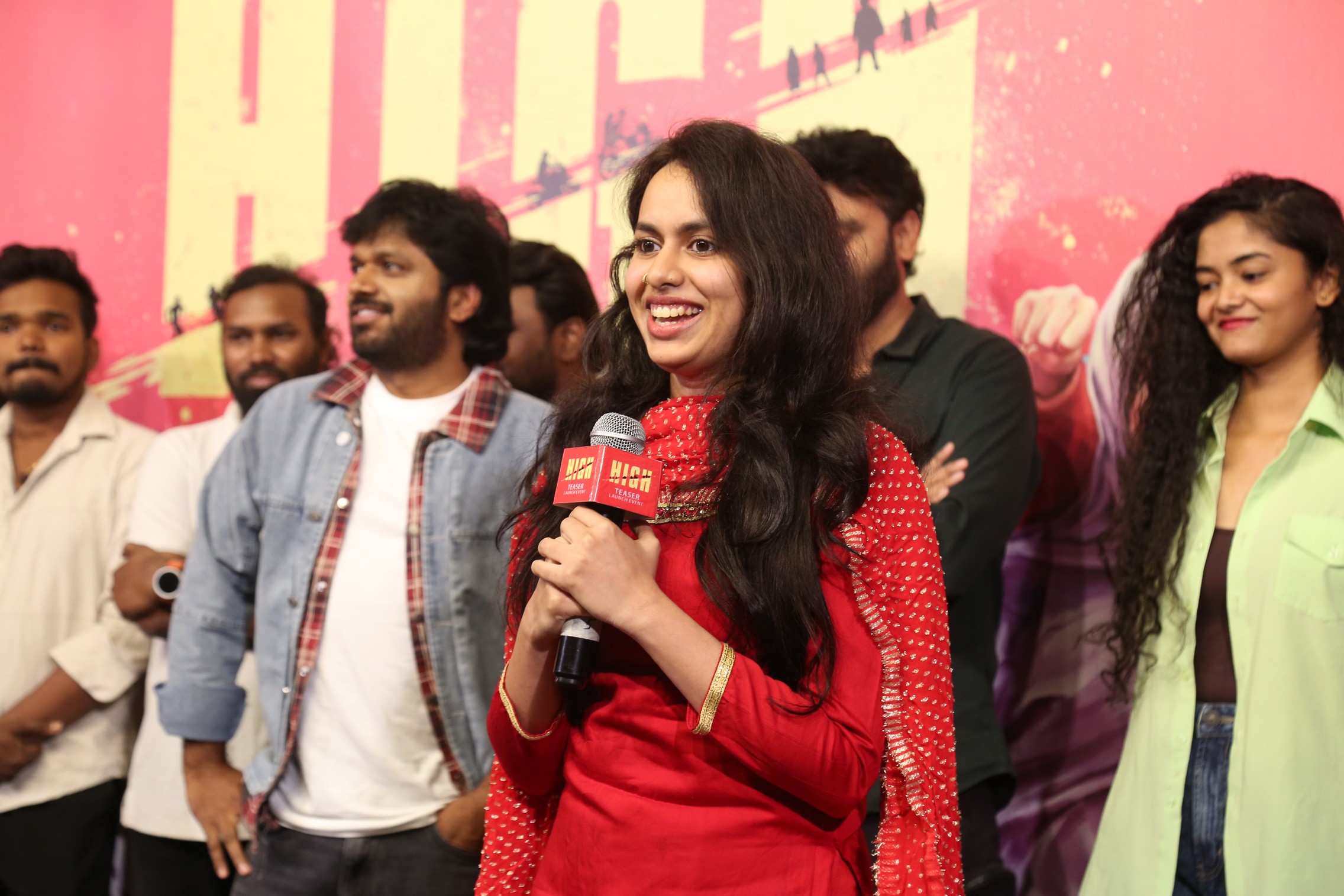 Pallavi Dora speaking on stage