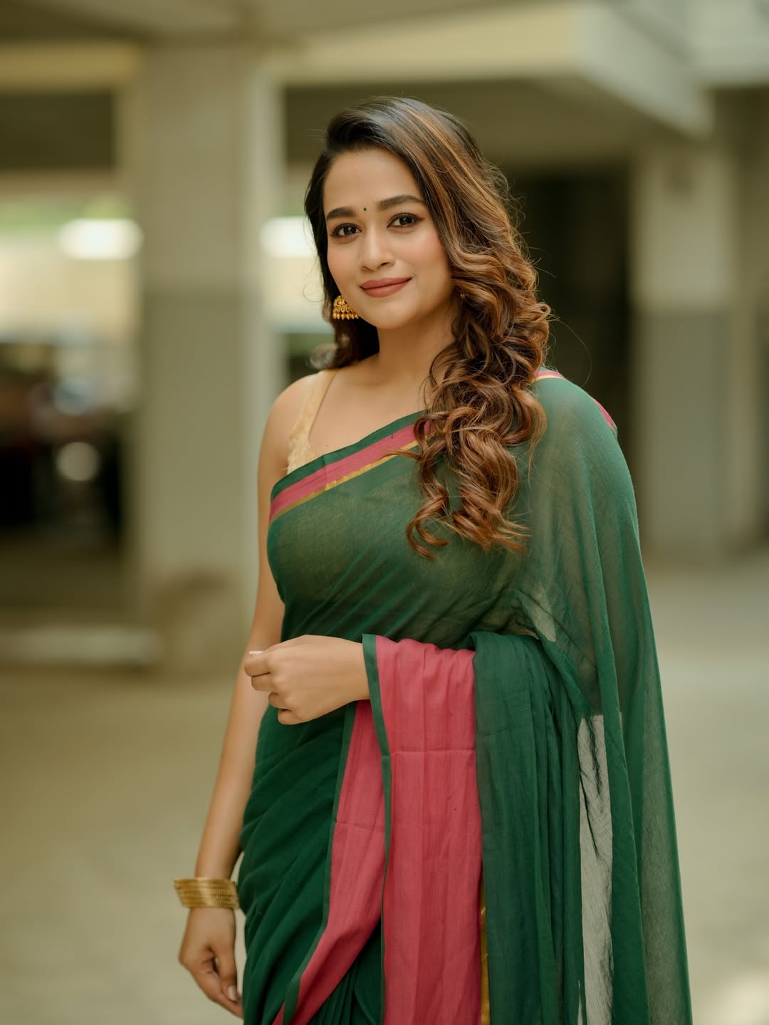 Kaavya Arivumani dazzling in green saree elegance