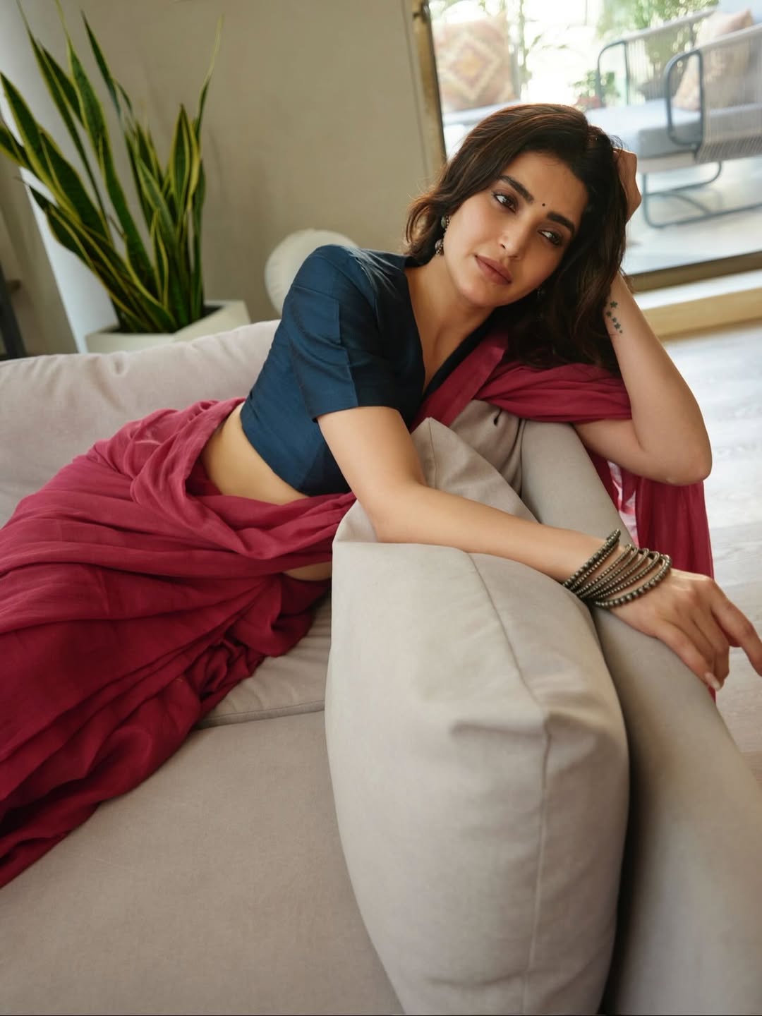 Karishma Tanna stylish lounging with confident attitude