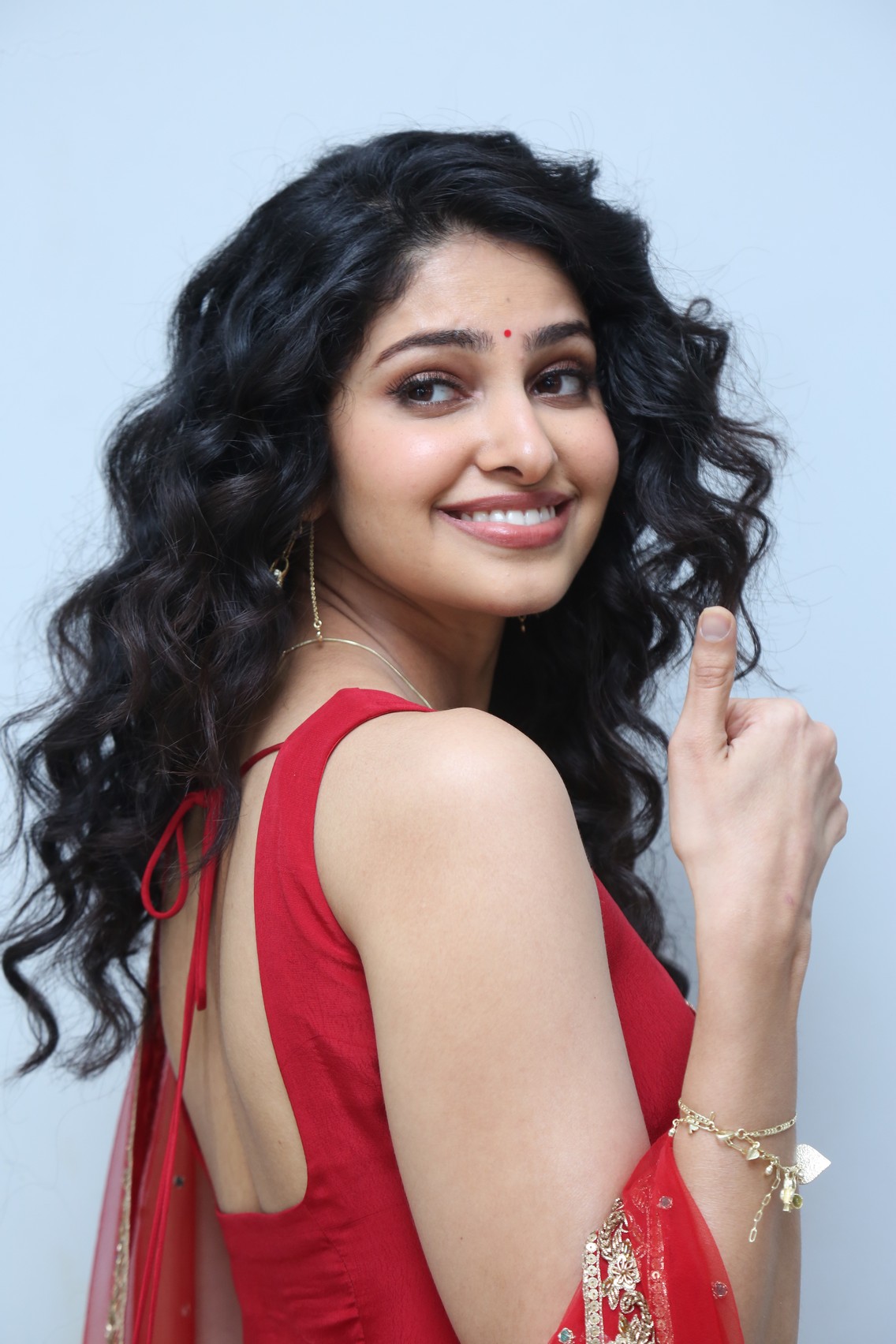 Manasa Varanasi dazzling in stylish red saree