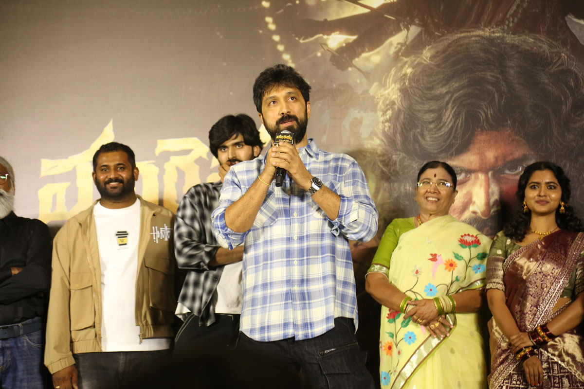 Director Bobby Kolli speaking at the event