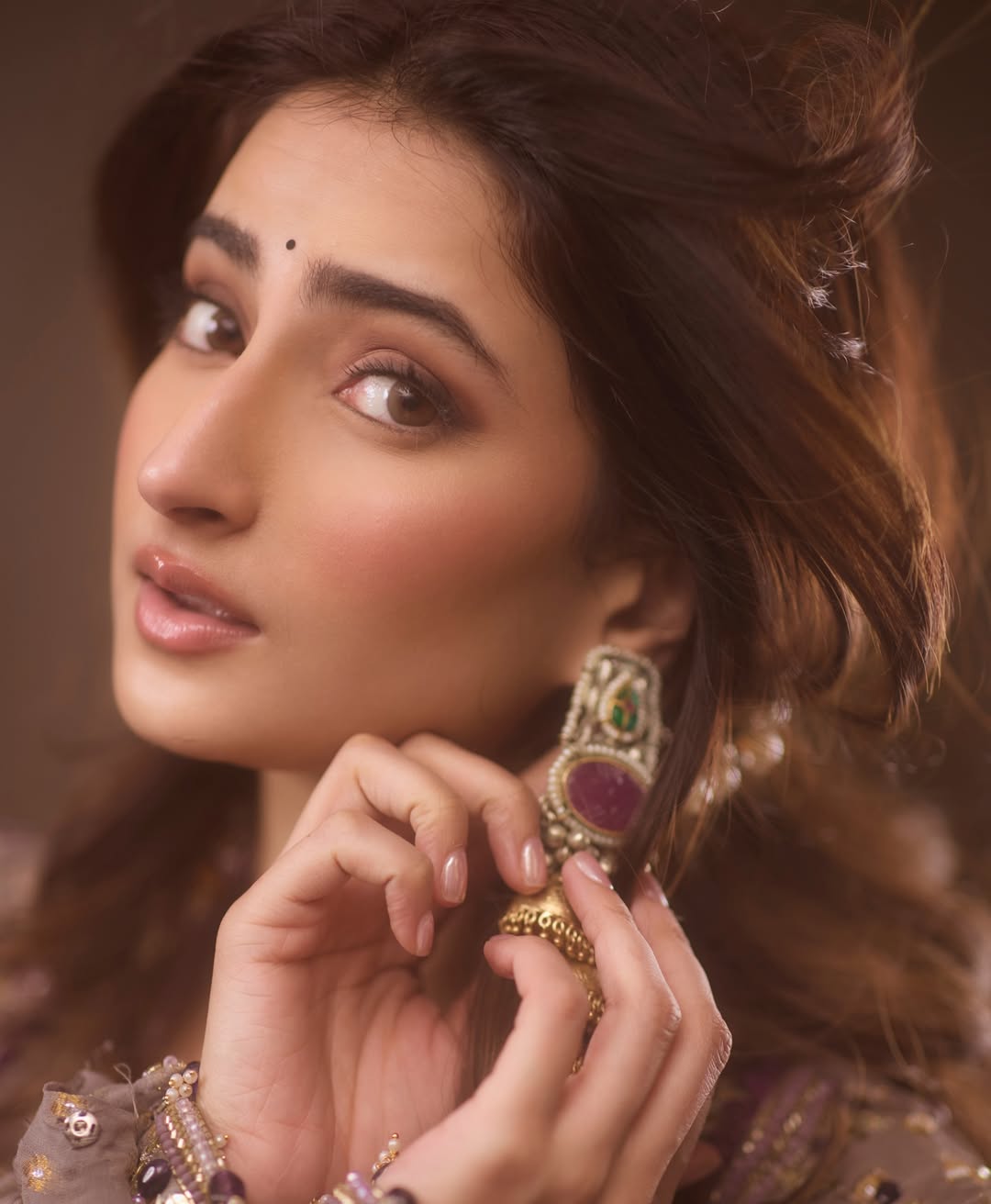 Palak Tiwari styled hair with traditional earrings