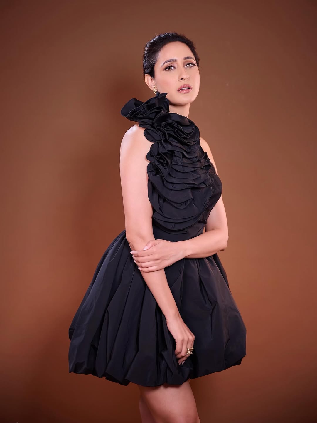 Pragya Jaiswal confident pose in black dress
