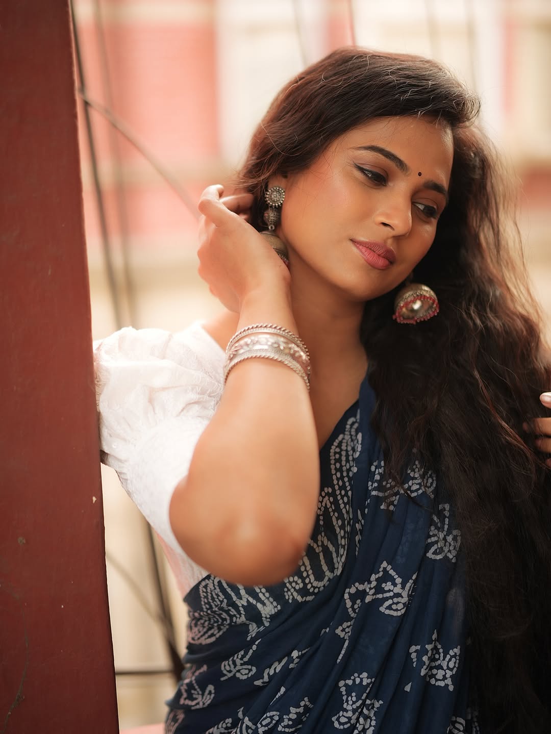 Ramya Pandian regal traditional look smiling