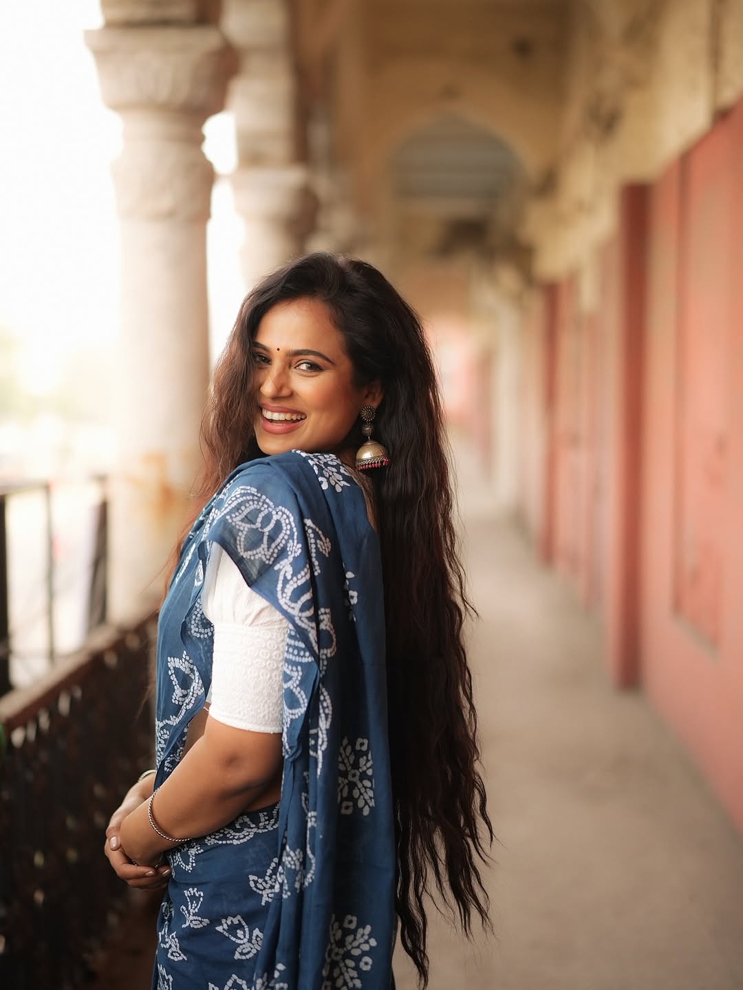 Ramya Pandian blue saree graceful smile