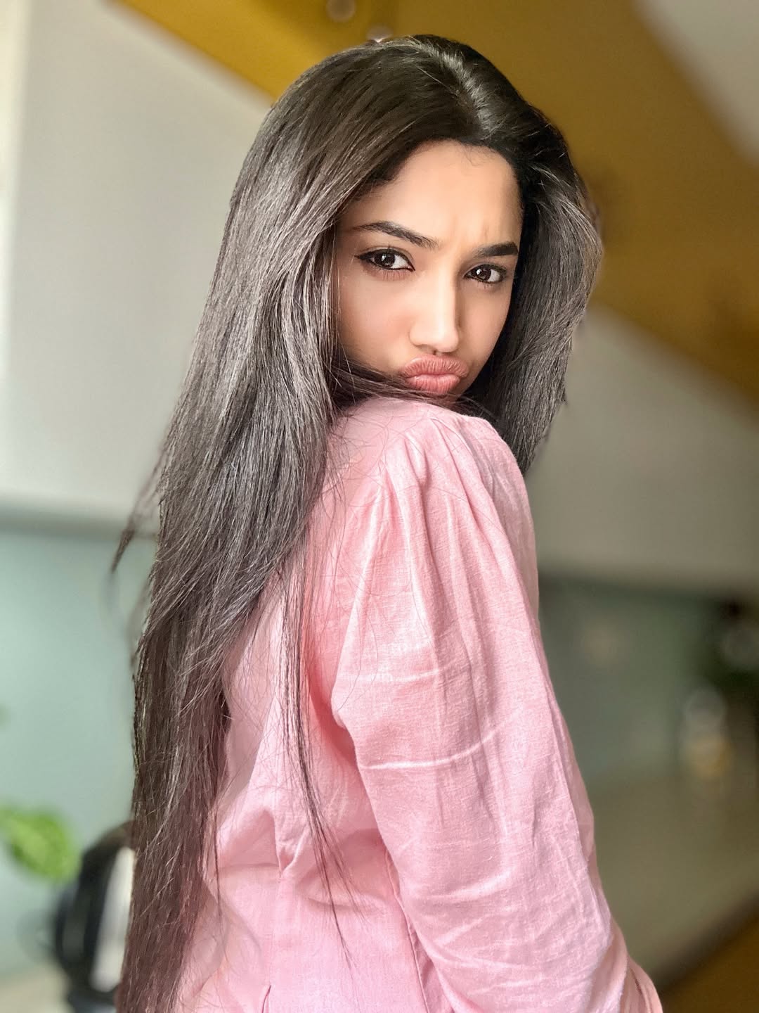 Reeshma Nanaiah confident pose in pink dress