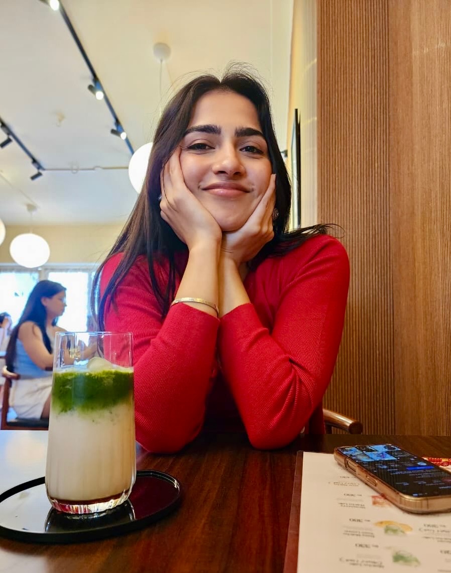 Rukmini Vasanth confident smile stylish red outfit