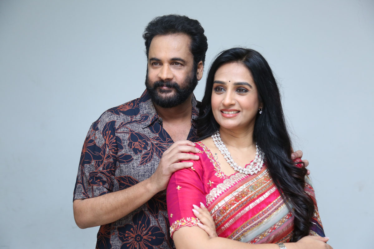 Sivaji and Laya posing together at event