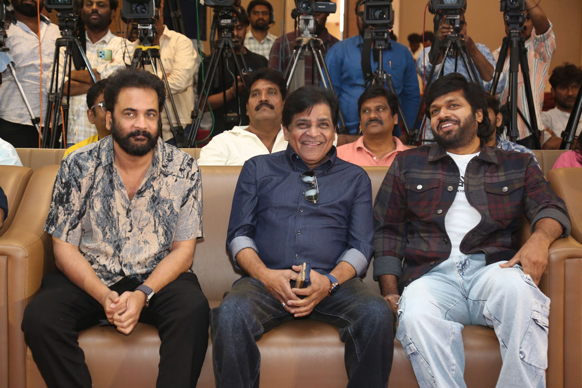 Sivaji Ali Anil seated at event