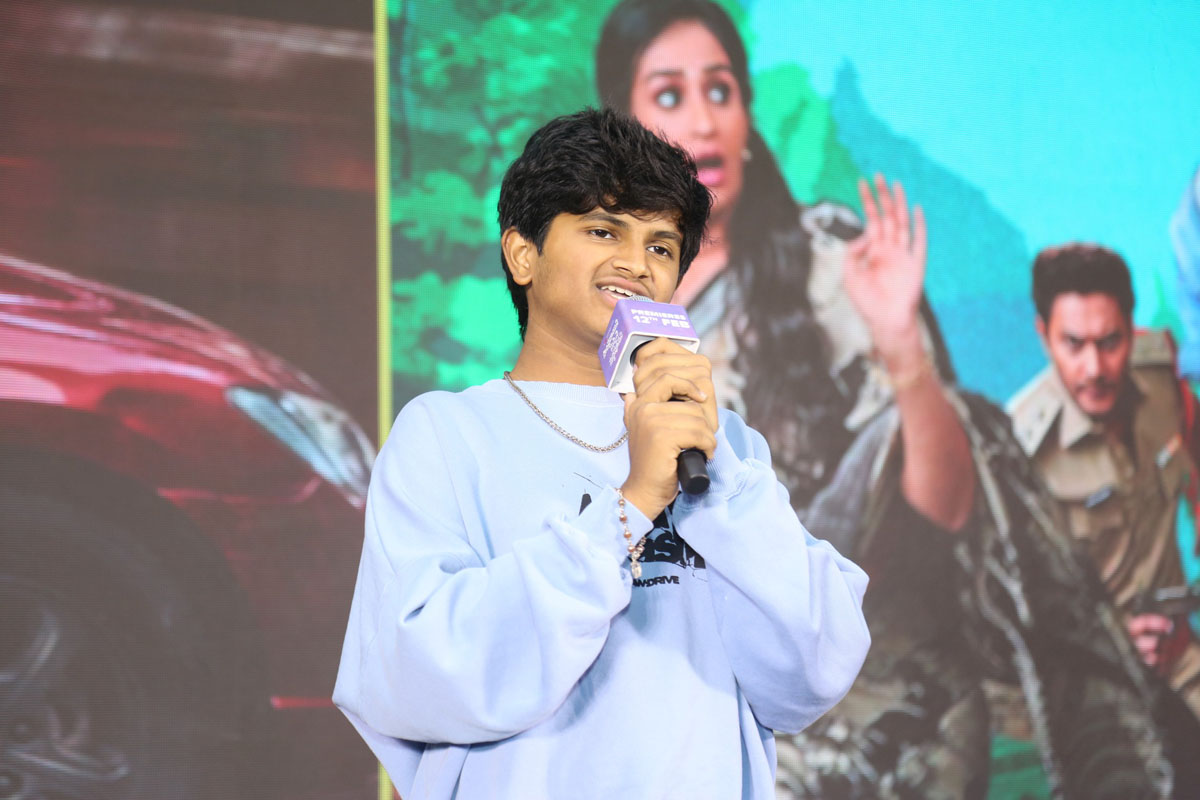 Child artist Rohan addressing audience