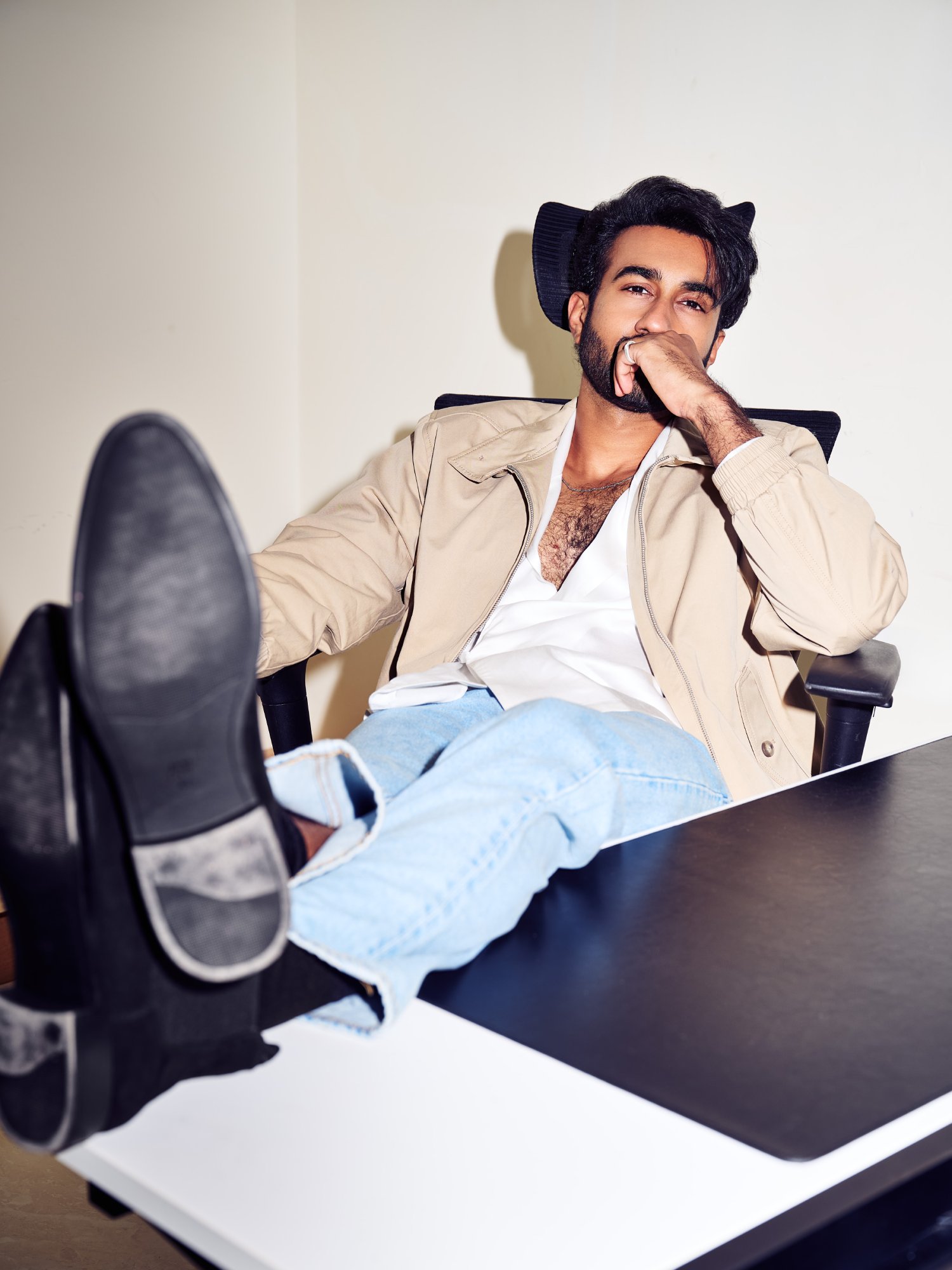 Santosh Sobhan relaxed stylish corner pose