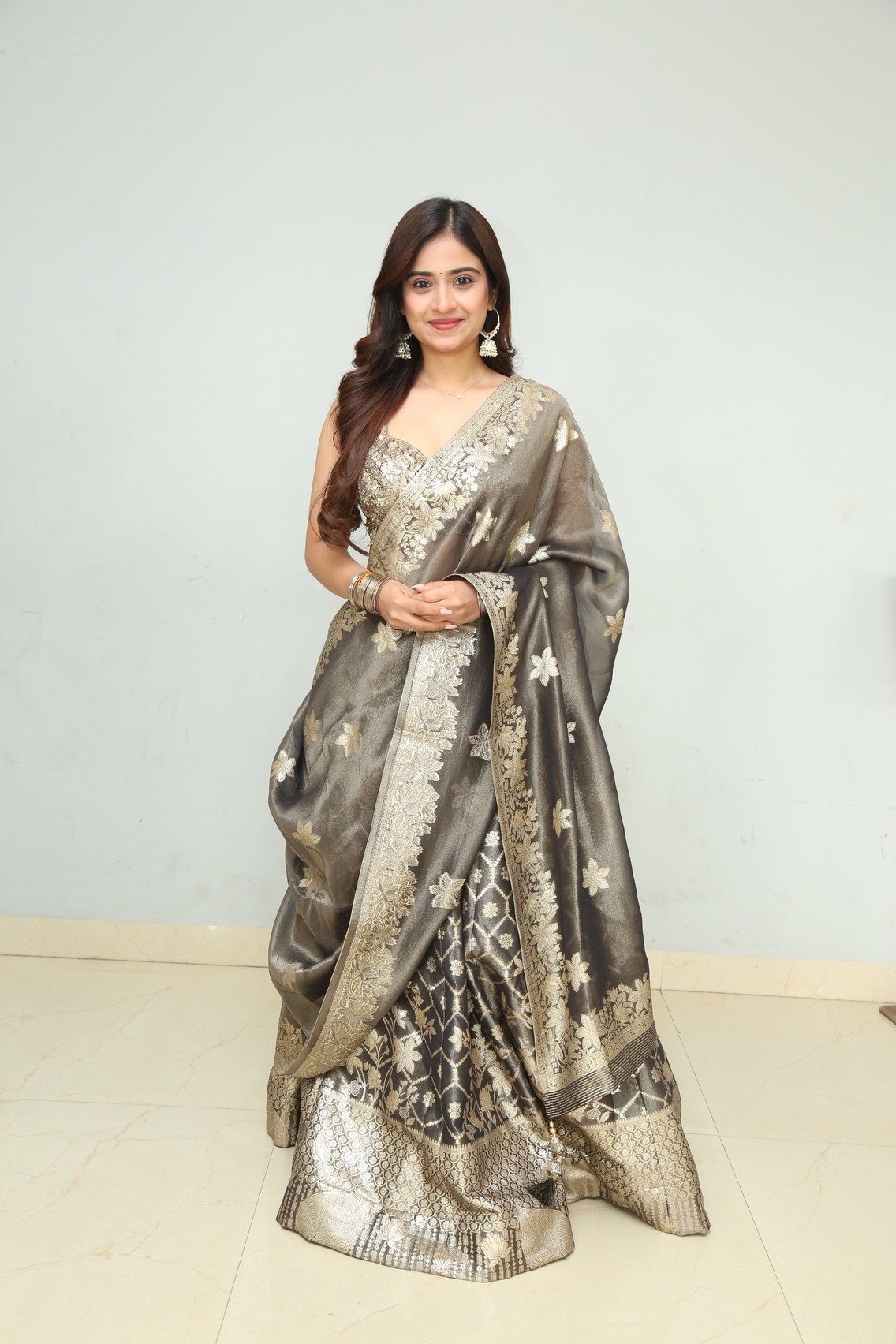 Saylim Chaudhari sparkling saree with radiant smile