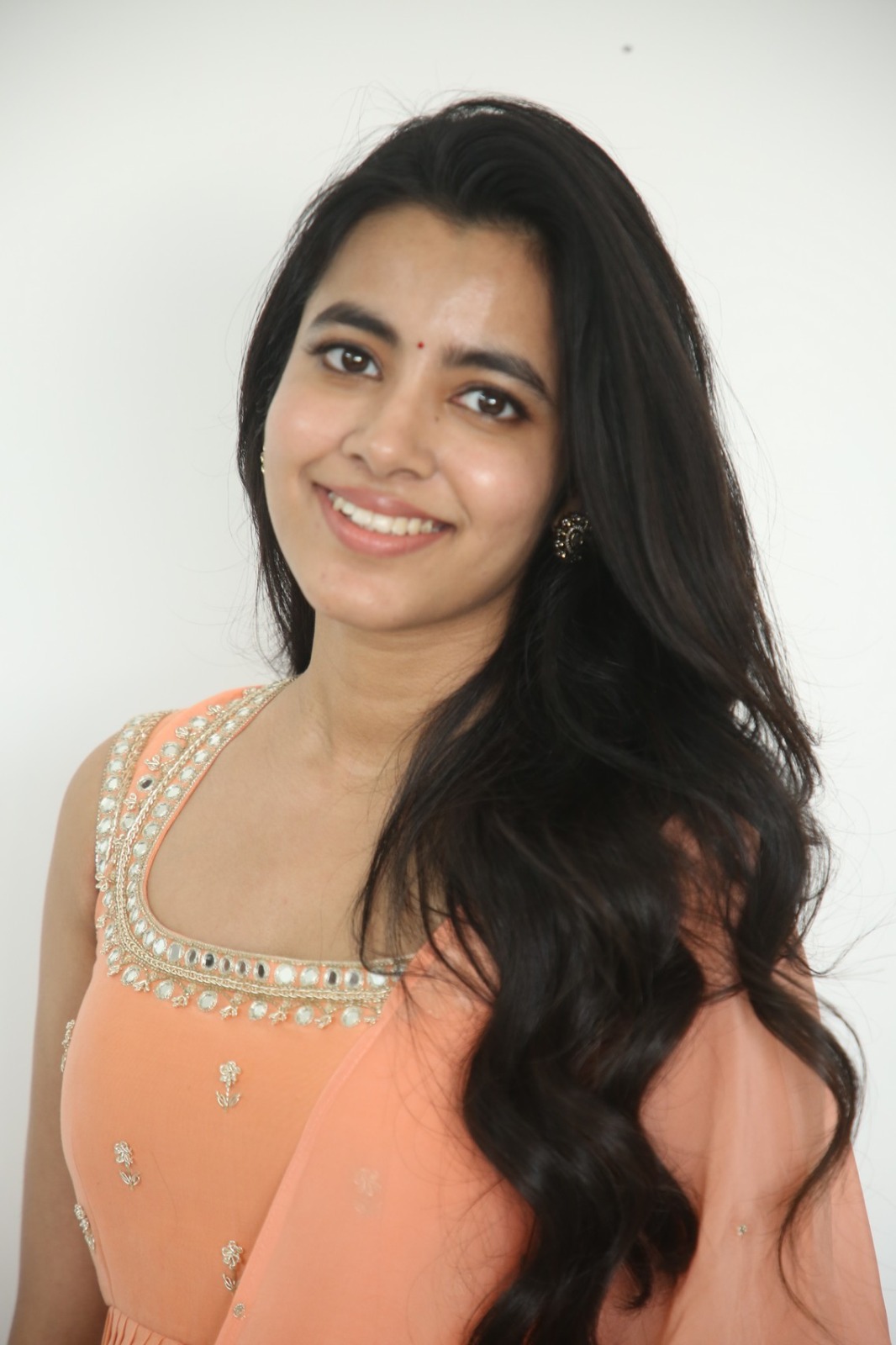 Shivani Nagaram posing gracefully with flowing hair