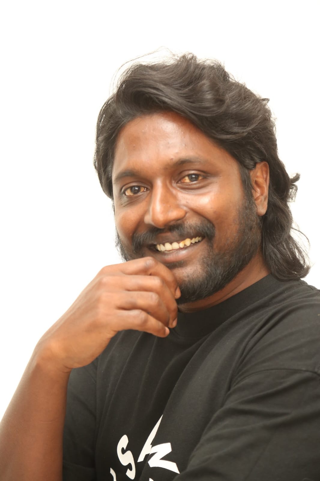 Suhas laid back fashion with charismatic smile