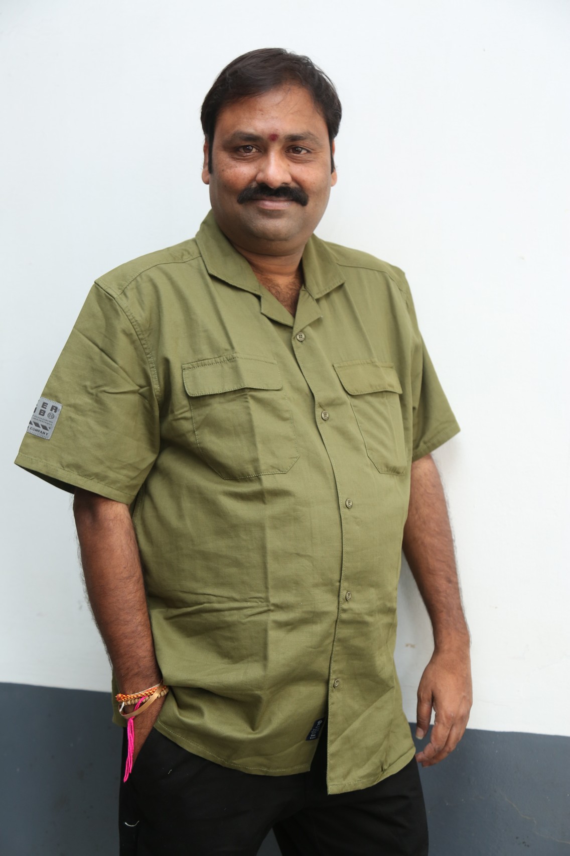 Suman Babu commanding style in sharp uniform look