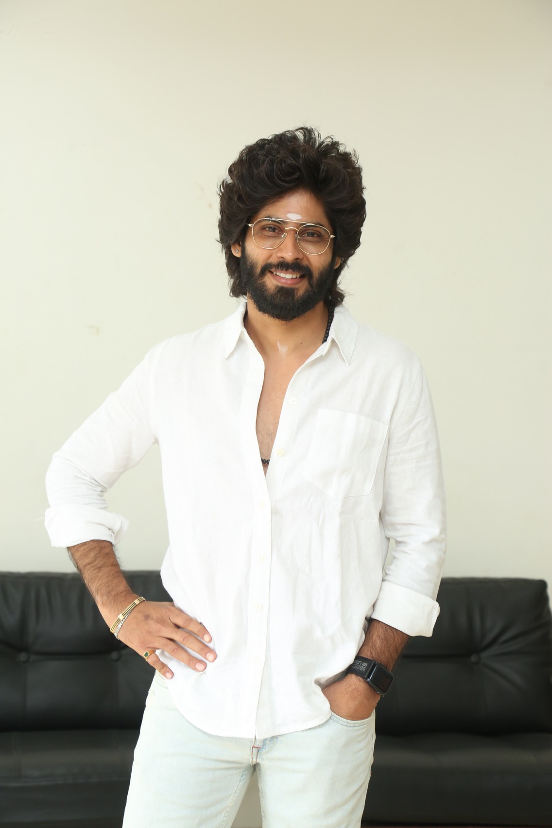 Amardeep Chowdary posing at press event