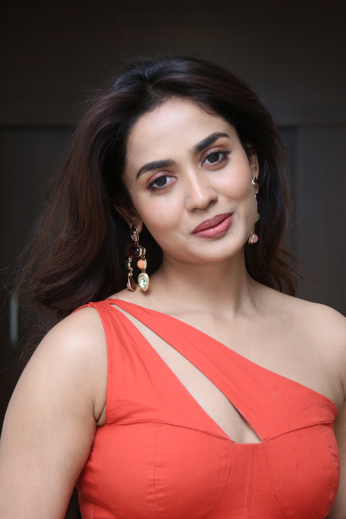 Teju Ashwini stylish pose with statement earrings