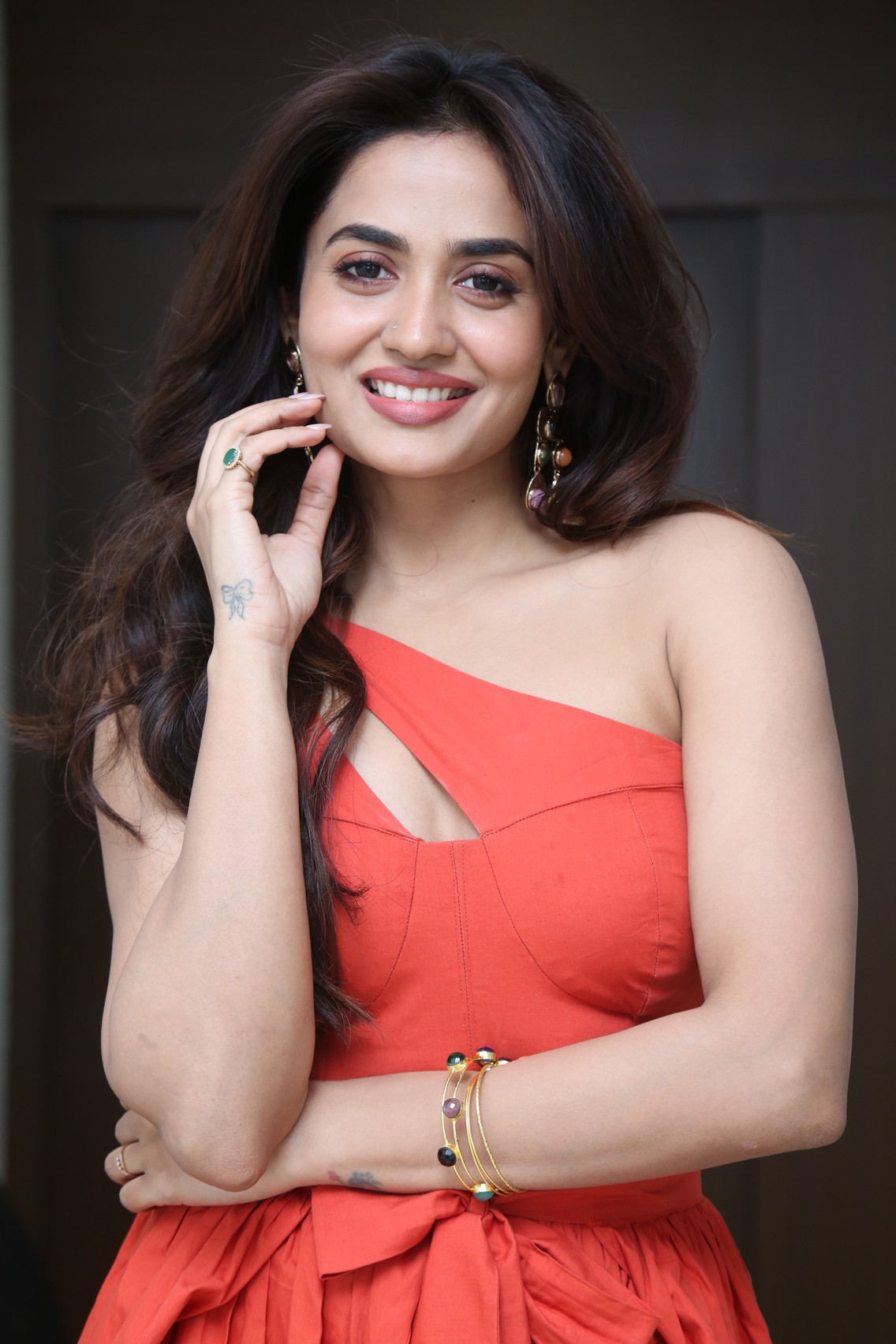 Teju Ashwini stunning coral style and smile