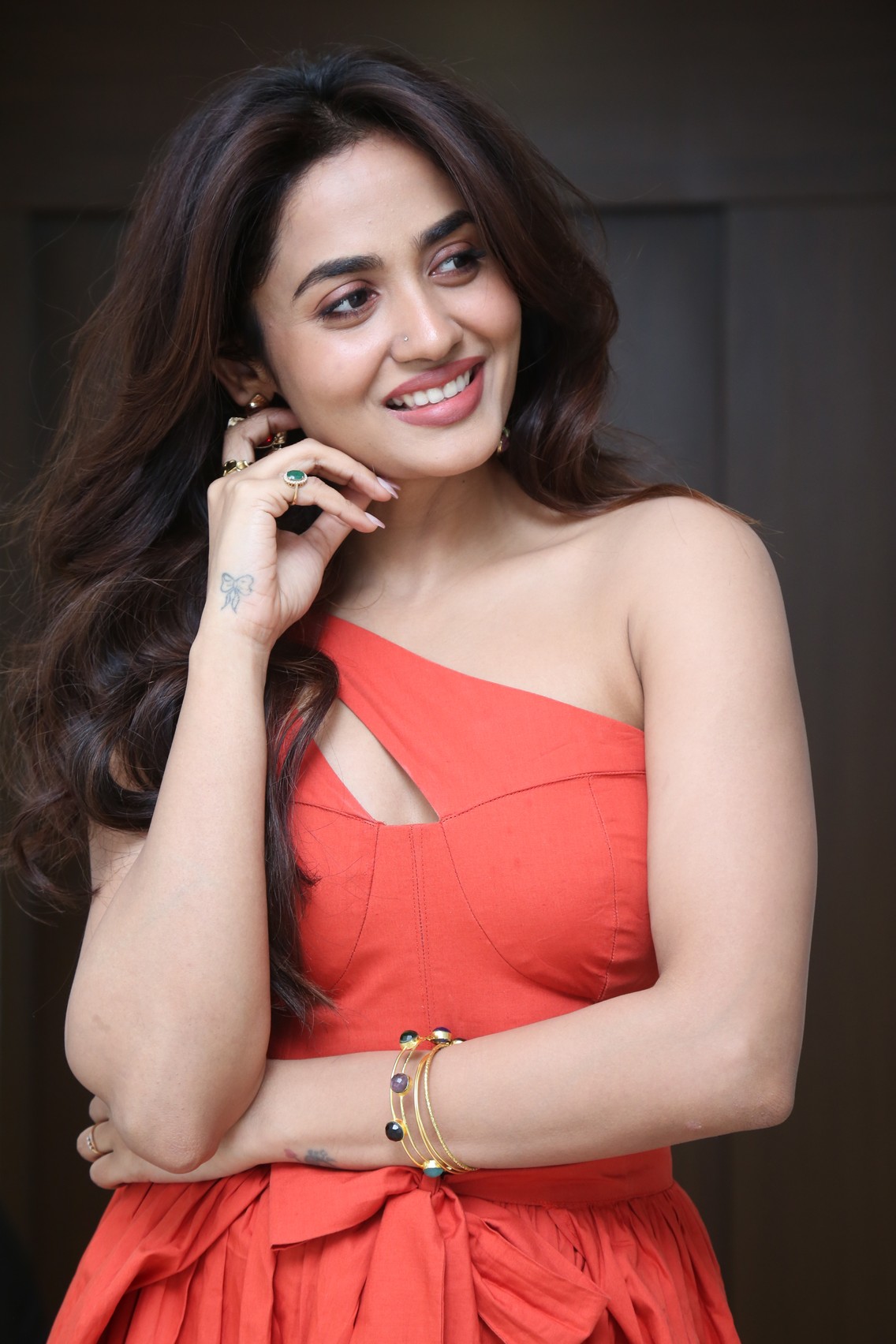 Teju Ashwini vibrant coral fashion spotlight look